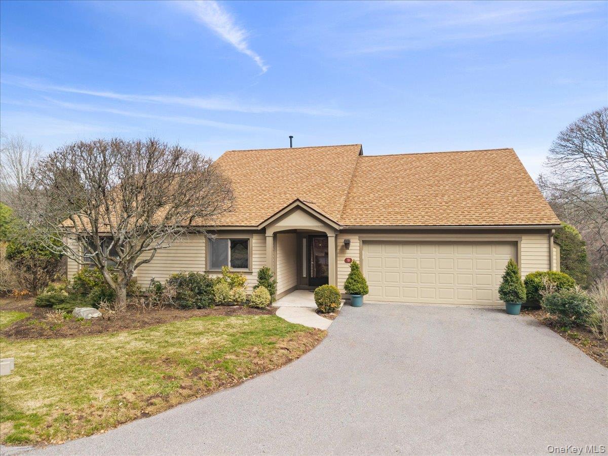 Welcome to Heritage Hills, one of Westchester County’s most sought after communities! And here’s something you don’t see every day… an extremely desirable Stratford II unit, DETACHED, ONE LEVEL, NO STEPS, 2 bed, 2 bath home with a 2 car garage. It is the kind of opportunity that rarely comes along. From the moment you enter this beautiful development, set across 1,100 acres of rolling greenery, you can feel what makes this place so special. It is not just where you live, it is how you live. Five swimming pools, tennis & pickleball courts, a vibrant clubhouse, endless social activities, and an incredible 18 hole golf course are all right at your fingertips. Whether you are meeting friends for a round of golf, enjoying dinner at The Grille at Somers Pointe, or stopping by The Prime Pub for a relaxed evening out, everything you need is on site. And the convenience is hard to beat. Shuttle service to Metro North, and just a short distance to shops, cafés, restaurants, banks, and everyday essentials. Step inside and you will immediately appreciate how clean, bright, and move in ready this home truly is. Enter directly from your spacious 2 car garage into a welcoming, open foyer with a large closet to keep everything organized. The main living space flows graciously, with an expansive living and dining area centered around a cozy fireplace. Sliders lead to a peaceful deck, giving you that ideal indoor outdoor feel. The kitchen is just as inviting, featuring crisp white cabinetry, granite countertops, stainless steel appliances, and a sunny eat in area with its own set of sliders to the outside. Down the hall you will find a convenient laundry closet and a full bathroom with a walk in shower. The second bedroom is generously sized and flexible for guests, a home office, or whatever suits your lifestyle. And then there is the primary suite, a calm and comfortable retreat with ample space, a large walk in closet, and a private full bath with soaking tub and separate walk in shower. There is also a great attic, and between the oversized garage and smooth, level driveway, you will have more than enough room for parking and storage. If you have been waiting for easy, one level living in a community that truly has it all, this is it. Come experience Heritage Hills for yourself, you will never want to leave.