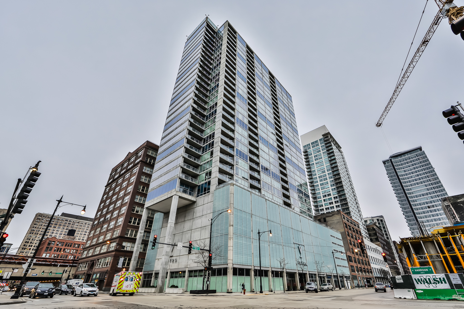 This Modern 3bed/2.5 Bath in the South Loop will check all your boxes! Renovated Chefs' kitchen w/Quartz waterfall counters, custom cabinets, GE Stainless Steel appliances, & breakfast bar. If you like views, then you will love how this corner unit is wrapped in windows that give you amazing River & City views. Open living space is perfect for entertaining. Unit features in unit washer/dryer,  new hardwood floors & carpet, oversized balcony & custom shelving. Large primary bedroom w/custom WIC & ensuite bath that includes double vanity, separate tub, & rain shower. Generous sized 2nd Bedroom. 3rd bed is great for guests or office! Deed Parking is included in the price. Full amenity building w/ doorman, fitness center, patio, community room, bike storage, sauna/spa rooms, storage lockers, & more! Enjoy easy transportation, Grant Park, restaurants, & nightlife.