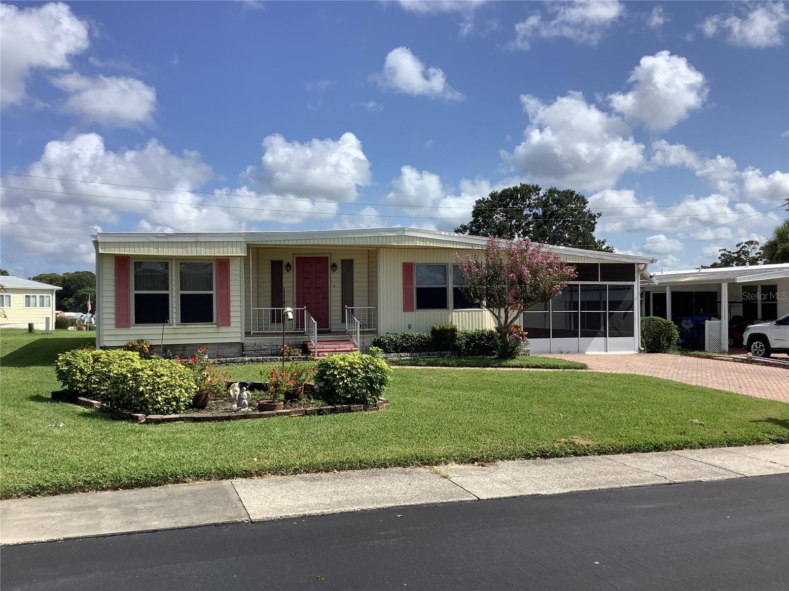Welcome to 269 Salem Ave in highly desirable Lake Tarpon Mobile Home Village. 55+, golfcart community. Very active and social community.Amenities include heated pool, shuffleboard, dock, and boat ramp. Very active clubhouse with many scheduled events. Sits on beautiful Lake Tarpon. Very low maintenance fee 0f $109.00. Home is a true 3 bedroom. Nicely updated. New roof. Screened in Carport. Nicely landscaped with newer pavers. Call today.