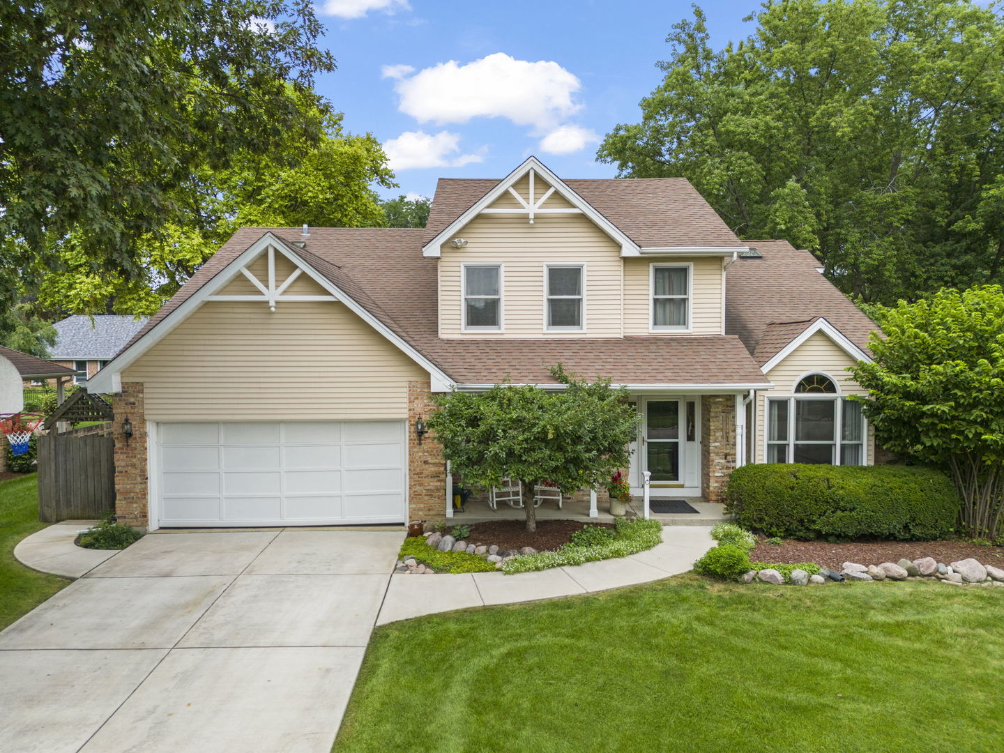 Welcome to 2002 Middleton Drive in the highly sought after Stonehedge neighborhood in Wheaton. The original owners are sad to leave this impeccably maintained home that is ready for the next lucky owners!  There is a long list of recent updates, including all new top of the line carpet, all new interior paint, refinished hardwood flooring on the main level, new epoxy floor in heated garage, newer double hung Marvin windows and new HVAC in 2019.  The front door opens into a grand vaulted living room with a Palladian window and attached convenient first floor office or den.  A separate family room with brick fireplace, built in bookshelves and hardwood floors is adjacent to the kitchen with newer appliances and abundant storage options.  The first floor laundry room is next to the kitchen and has extra space for an additional fridge or a mudroom. Upstairs you'll find 4 generous sized rooms and a grand primary suite with a double door entry, walk in closet and a large primary bath with two sinks and a separate tub and shower.  The unfinished basement is ready for whatever you need - workshop, family room or exercise area.  The 2 car garage is heated and has a new epoxy paint on the floor and also includes an extra 220 volt outlet for your electric vehicle.  The location cannot be beat as this property is close to expressways, shopping, forest preserves, parks and the Wheaton community center in the award winning D200 school district.  Welcome Home!