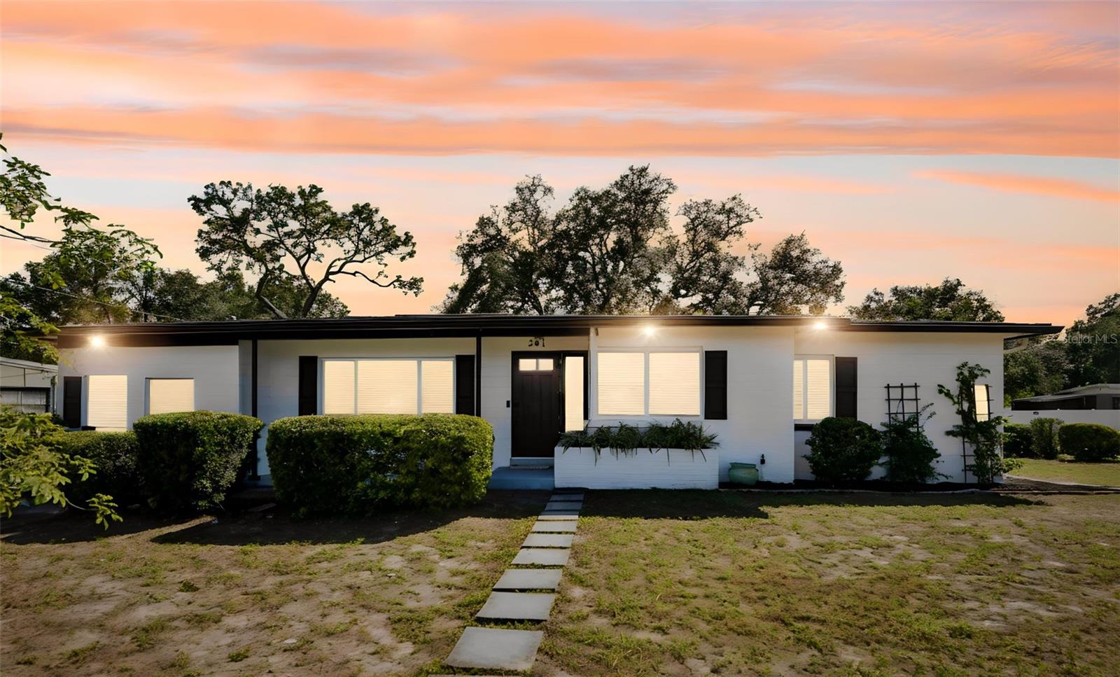 Completely renovated and set on an expansive corner lot of nearly a quarter acre, this 4-bedroom, 2-bathroom Temple Terrace home delivers the space, modern updates, and move-in-ready appeal buyers are looking for. Just minutes from the Temple Terrace Golf & Country Club, this inviting residence pairs a fresh, contemporary interior with an oversized backyard and a location that puts shopping, dining, and everyday conveniences within easy reach. Natural light fills the living spaces, highlighting the neutral finishes and luxury vinyl plank flooring that flows throughout, creating a clean, cohesive look with no carpet. The thoughtfully designed split-bedroom layout offers added privacy, while distinctive barn doors introduce a touch of character to the home's updated style.Inside, a light and bright atmosphere, neutral finishes, and luxury vinyl plank flooring throughout create a clean, contemporary feel, while the split-bedroom layout provides added privacy and flexibility. The updated kitchen brings everyone together with a center island, stainless-steel appliances, subway tile backsplash, and floating shelves that add a stylish finishing touch.Outside, the oversized backyard offers room to entertain, garden, play, or simply enjoy the Florida sunshine, with a spacious deck for outdoor gatherings and a storage shed for added convenience. The washer and dryer are also included, adding to the home's practical appeal. With extensive renovations, valuable outdoor space, and a desirable Temple Terrace location close to golf, shopping, and dining, this home is an opportunity to enjoy more of what matters without compromising on location or style.