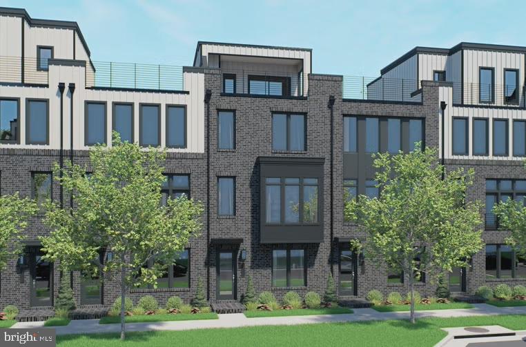 Introducing Sunset Station — a collection of newly constructed luxury townhomes in the vibrant heart of Reston, Virginia, by Dream Finders Homes, nationally recognized as 2025 Builder of the Year. These townhomes set a new standard in sophisticated design, outstanding quality, and lifestyle-focused living. Located within Reston’s American Dream Way neighborhood, Sunset Station offers easy access to Reston Town Center, Metro stations,  W& OD Trail, community parks, shopping, and transit options.The neighborhood is being developed with walking paths, landscaped outdoor spaces, trails, and amenities to foster a true neighborhood feel.  It is truly a one-of-a-kind oasis!(Homesite 16) This home is currently under construction, and will be ready in November.  END UNIT  4-level Whitman model, featuring a Rec Room & Powder Room on the entry level, and 2-car garage in the rear.  Oak staircase leading to the main level, welcoming you into the open & airy floorplan with 10’ ceilings and full length casement windows.  This kitchen boasts an oversized center island with Waterfall quartz countertops, large farmhouse sink and Kohler fixtures.  Kitchen Aid - Premier package appliances with hood vent, Gas cooktop, built in microwave and wall oven is every chef’s dream.  Gray shaker panel cabinetry throughout, including a coffee bar next to pantry.  Great Room with electric fireplace, looking out onto the Sky Lanai which is the covered outdoor living space. Upper level is constructed with 3 bedrooms and laundry room.  The Primary Suite is truly a private retreat, with dual walk-in closets and large seated shower.  The 4th level Loft with Rooftop Terrace is a showstopper!  The Loft features an open living room, a powder room and a Wet Bar.  The terrace is huge, and has a large portion of covered and uncovered living space, with privacy walls on each side.  Optimal for peace and tranquility.