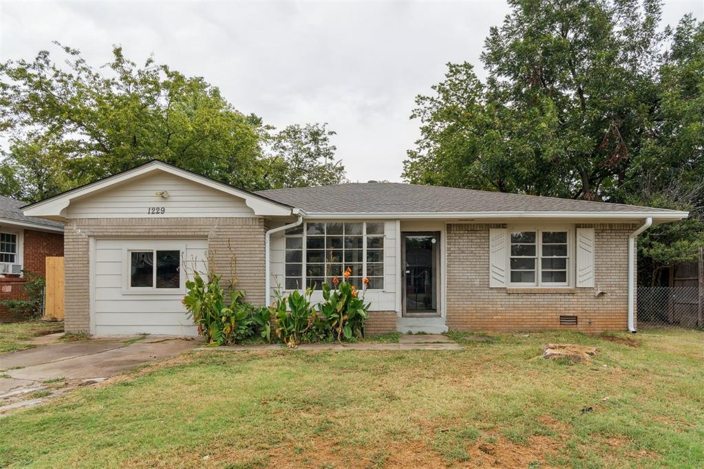 Looking for a true 4 bedroom you found it for a great price.  This home has new flooring, countertops and tub surround, Brand NEW ROOF just put on this property. Enclosed front porch could be turned into a beautiful retreat that a plant lover couldn't resist.  Large backyard great foe entertaining. Buyer to verify all info including schools and sq footage.