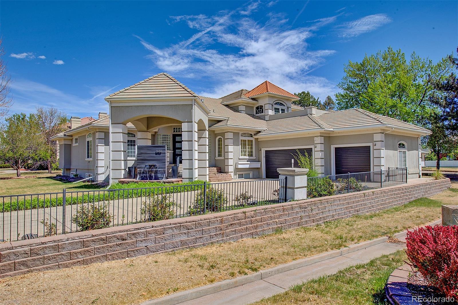 Welcome home to your Denver retreat! This estate will aw you the minute you pull up to the nearly 1/2-acre lot sitting in a quiet cul-de-sac with the resort style covered front entry complete with custom water feature. Upon entering the home you’ll find abundant natural light from the large windows and open concept floorplan. The living room, family room and kitchen are perfectly connected for entertaining, yet beautifully separated by a double-sided fireplace. The kitchen is sure to impress with modern appliances, amble countertop space and beautiful custom stone backsplash. The main-level primary is an oasis everyone dreams of. The large room features plenty of space and offers French doors leading outback to the private pool and hot tub. The primary ensuite was featured on HGTV with it’s huge walk-in shower with double rain shower heads, double sink, impressive tile work throughout and finished off with the standalone soaker tub! Head upstairs and you’ll find two large bedrooms and mountain views from the large, walkout rooftop private patio! Back down in the basement you’ll find a large family room with an additional fireplace, large theater room, a huge wet bar that’s more of a second kitchen and walkout basement leading you to the private backyard! The backyard will continue to impress with the private pool, hot tub and multiple sitting areas to enjoy. This one is truly an estate you will need to see to appreciate and not a home that comes available every day! And in case you want to leave your home retreat, you’re in a perfect location with Denver, parks, walking trails and so much more nearby and don’t forget about the sought after Cherry Creek School District! This one will go fast, so schedule your private showing today before it’s the one that got away tomorrow!
