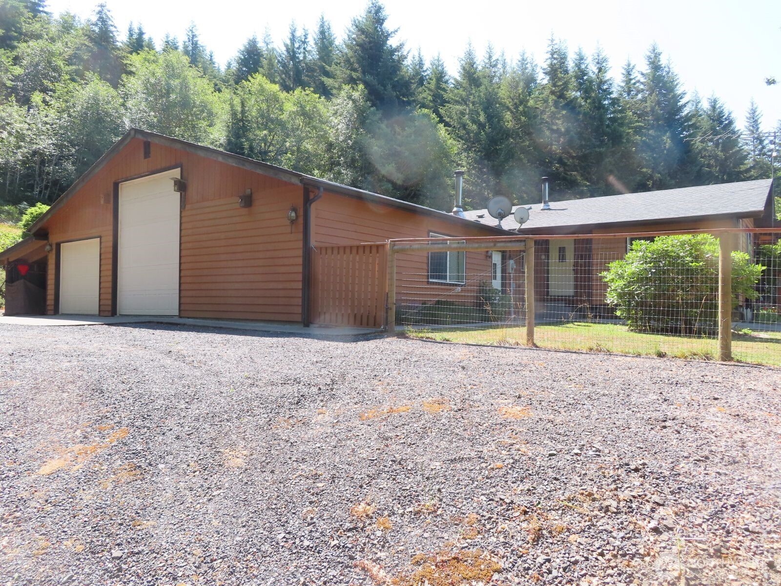 Available for the first time, this 75+ acre legacy tree farm features a well-built, well-maintained 1,700 sq. ft. single-story home just 15 minutes from I-5 in Chehalis, WA. The property offers privacy and natural beauty, featuring a thriving tree farm of trees aged 30 to 70+ years that covers the entire acreage. Manicured trails wind throughout the land, leading to a private pond among mature timber. The 1996 custom-built home includes 3 bedrooms, 2.5 baths, with an open, inviting floor plan. The large garage provides an RV bay, shop space, and additional storage for garden tools and equipment. The fenced backyard features a spacious garden and greenhouse, ideal for pets. Accessed by a tree-lined driveway set well back from the county road, the property ensures exceptional privacy. The substantial timber volume and size provide tremendous extra value to this home on acreage. The seller seeks a buyer who will continue to care for and manage the property and timberlands responsibly. Buyers intending to clear-cut the land are discouraged from submitting an offer.