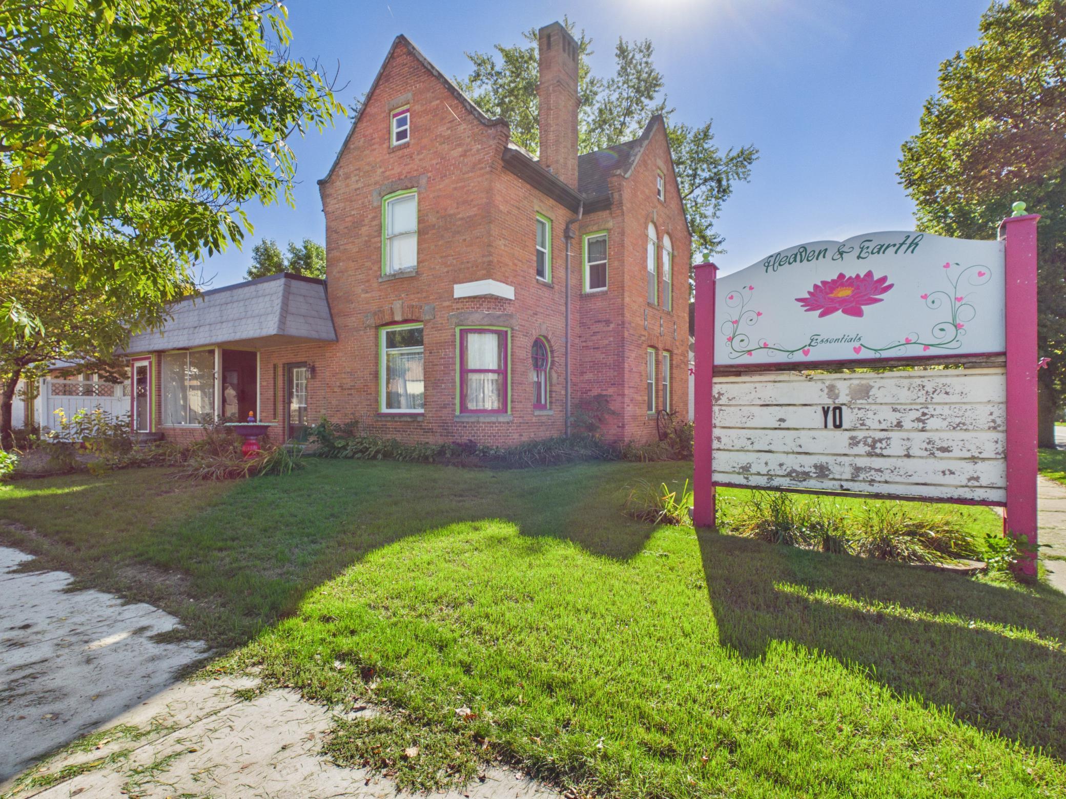 Historic charm meets business opportunity on Main Street in Sauk Centre! This distinctive property combines a 4-bedroom, 2-bath home with an attached, expansive commercial space, offering excellent visibility and U.S. Highway frontage. Hardwood floors and beautifully restored original woodwork from the 1800s showcase the home's timeless character. An attached 2-car garage and unfinished basement with a workshop provide additional space for projects and storage.The commercial portion features generous space with skylights, a kitchen and a bathroom, complemented by two greenhouses, a loading dock and a storage shed. Previously used as a B&B, tea house, crystal store and a flower shop, this property has a rich history of welcoming customers and guests. With both residential and commercial zoning, it offers a unique opportunity to bring your vision to life in a prominent Main Street location!