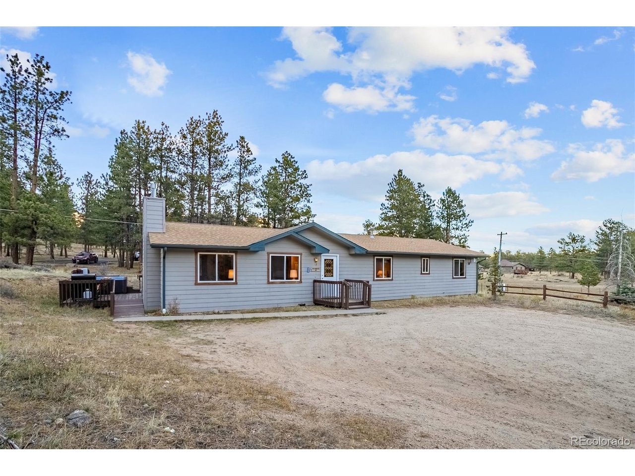 Spacious three-bedroom, two-bath cabin in the woods bordering the Rocky Mountain National Park! Handicap accessible main-level living with a large primary bedroom and an ensuite bathroom with a jacuzzi tub and a private hot tub. The hall bath has 2 showers, with 1 of them being handicap accessible. Available for immediate occupancy. All furnishings are included in this beautifully adorned, adorable cabin. A cozy gas fireplace for you and your guests to cuddle up to while enjoying the wildlife around you. You will love this location, only a couple of miles from the YMCA of the Rockies, and you can walk directly into Rocky Mountain National Park on marked trails, and it is less than 2 miles from the Beaver Meadows entrance to RMNP. Plenty of hiking and rock climbing in close proximity. This property has an abundance of wildlife wandering through for you and your guests to enjoy. Buyer or buyer's agent to confirm house and room measurements. No short-term rental ("STR") license. Buyer will need to check with Larimer County if you are considering short-term rentals. Larimer County has indicated that road improvements to Eagle Cliff Road may be required before issuing a STR permit. Seller is working with the county for more information. The property is not located in the Town of Estes Park.Danette Barrett is a Colorado-licensed real estate broker and also a principal of Seller.