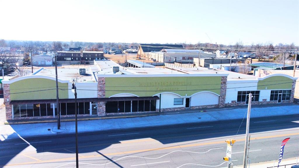 Commercial property in high-visibility location on SW 29th Street, minutes from Downtown OKC and Stockyards City. Previously operated as a successful furniture store, the building includes a spacious 9,504 SF showroom and office area, plus an additional 4,200 SF warehouse with high rear door for easy loading and two side entries connected to a newer storage wing. Zoned C-3 and adaptable for retail, distribution, showroom, office, or event use. Features parking in front and rear with access from both SW 29th and SW 30th Streets. Security system. This property offers a strong opportunity for owner-users or investors looking to operate or redevelop in an area seeing steady commercial growth. New Pictures coming soon.