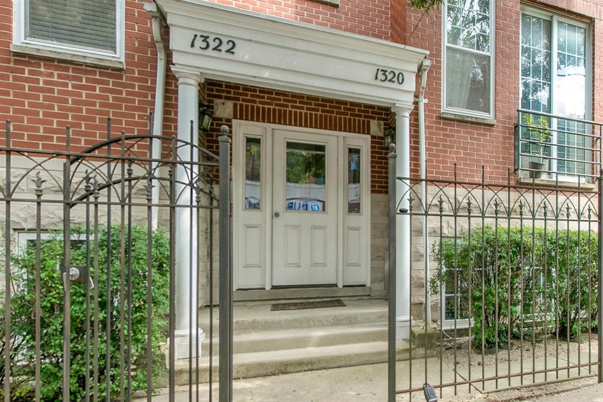 Welcome to this stunningly renovated 2-bedroom, 2-bath condo in the heart of Lakeview! Offering nearly 2200 square feet of living space, this spacious second-floor home combines modern finishes with an unbeatable location. The open-concept kitchen is a chef's dream with abundant cabinet space, quartz countertops, stainless steel appliances, and a breakfast bar that seamlessly connects to the expansive living room. Gleaming hardwood floors, oversized windows, and a shiplap fireplace create the perfect blend of warmth and style. Both bedrooms are generously sized, with the primary suite featuring large walk-in closet, a beautifully updated en suite bath, and sliding doors that lead to a large private deck-perfect for relaxing or entertaining. Additional highlights include brand new windows, new furnace, AC, and water heater, in-unit laundry hook-up, and an assigned parking space in back. Steps away from Southport Corridor, situated directly across from Northwestern's medical clinic and a stones throw from Schubas, the El, shopping, and endless entertainment, this home places you in the center of it all. A truly exceptional Lakeview opportunity!