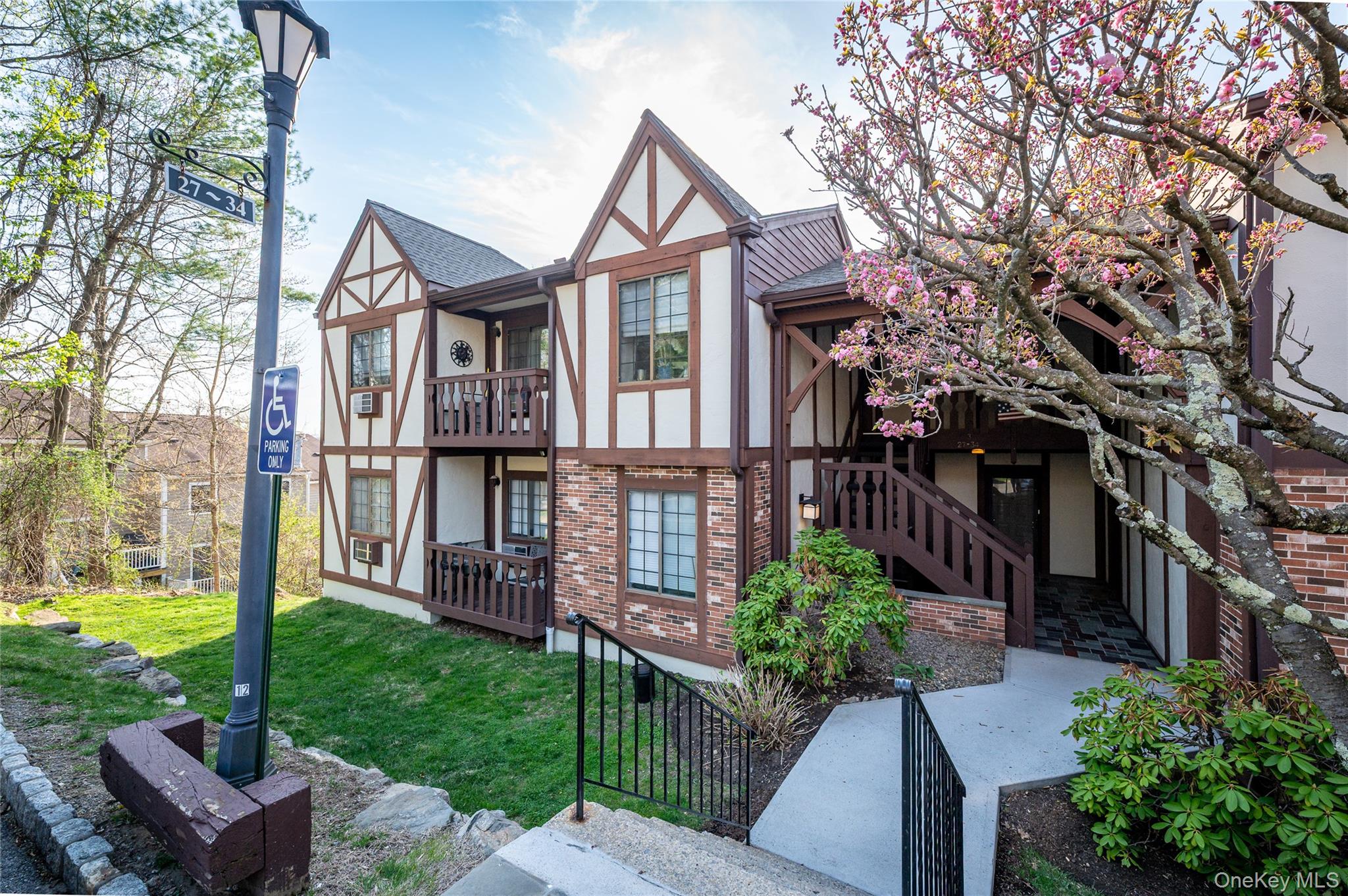 Lovely lower level, end unit condominium with beautiful views. Very private. Living room with closets for storage, dining area with door out to deck overlooking the backyard, 1 bedroom, 1 full bath, Laundry in hall. Foxwoods has an in ground pool for residents. There is a barbeque with picnic tables. Close to town, train, shopping, Saw Mill Parkway and 684.
