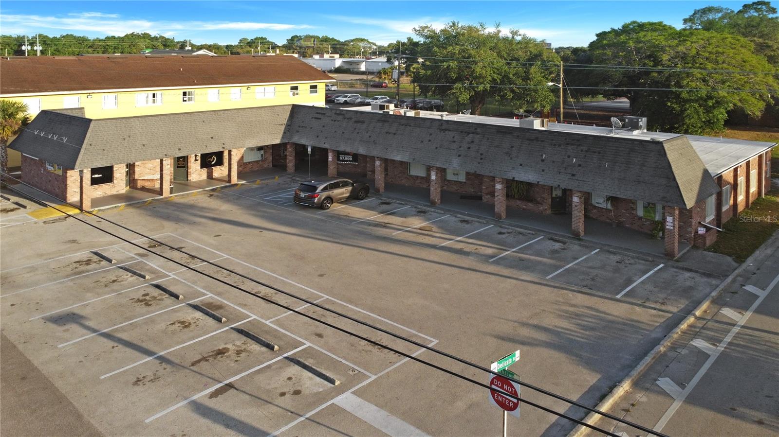 This mixed use (C-2 zoned) property consists of eight separately metered units that are fully leased for office and retail use. The property has 6640 square feet under air and plenty of parking with 22 available spots. Monthly fixed maintenance fees are only $500.00. The owner recently completed interior renovations including new flooring and paint throughout. The tenants are established and on staggered 1 to 4 year leases. Monthly rents total $16,700.00. This well maintained 1955 property is situated on a .41 acre parcel one tenth of a mile off of Semoran Blvd. Situated adjacent to high density residential.