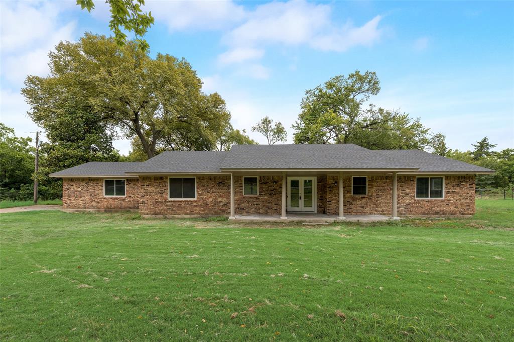 Step into this beautifully remodeled home featuring a modern open floor plan filled with natural sunlight. With 3 spacious bedrooms and 2 updated bathrooms, this home offers both comfort and style. The kitchen seamlessly opens to the living room, creating the perfect space for entertaining or enjoying family time. Large windows throughout the home bring in abundant light, enhancing the warm and inviting atmosphere. Outside, you’ll find a generous yard surrounded by greenery, offering plenty of space for outdoor activities, gardening, or simply relaxing in a private, natural setting. This move-in ready home combines modern updates with a bright, airy layout—perfect for anyone seeking a stylish retreat with room to grow.