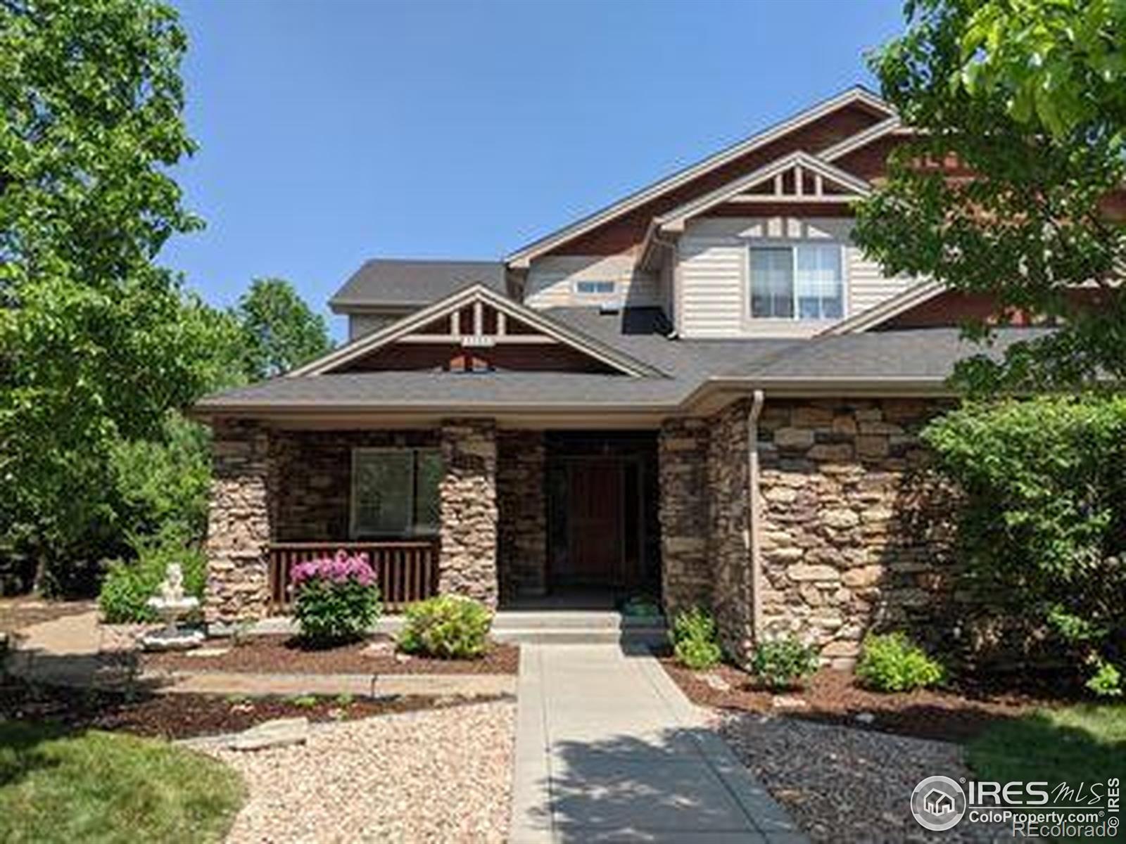 Set in a quiet enclave of larger homes with mature trees and spacious yards, this 5-bedroom, 4-bath custom home delivers space, flexibility, and long-term value in a highly desirable location within Boulder County schools. The spacious primary suite provides a private retreat with its own fireplace, window seat, oversized walk-in closet, and spa-inspired bath complete with dual vanities, jetted tub, and separate shower. Upstairs, two additional bedrooms share a Jack-and-Jill bath, while a third bedroom includes a private full bath. A main-floor bedroom with adjacent 3/4 bath offers excellent flexibility for guests, multigenerational living, or work-from-home needs. The home's dramatic two-story great room, anchored by a gas fireplace and large windows, creates an immediate sense of light and openness-ideal for both everyday living and entertaining. The well-designed kitchen features a Bosch induction cooktop and dishwasher, KitchenAid refrigerator, GE oven and microwave, abundant cabinetry, walk-in pantry, and a butler's pantry with glass-front cabinets. A breakfast nook connects seamlessly to the main living area, enhancing flow and usability. Recent major updates-including roof, appliances, flooring, lighting, radon mitigation system, epoxy garage floor, and two new hot water heaters-allow buyers to move in with confidence. Dual HVAC systems with smart thermostats ensure efficient, year-round comfort. The unfinished basement (1,737sq.ft.) with 9' ceilings presents a rare opportunity to expand living space and build equity over time. An oversized 3-car garage provides exceptional storage and functionality. Outside, the beautifully landscaped yard features over 30 trees and an established edible garden with grapevines, fruit trees, berries, and herbs-creating a private, park-like setting. Enjoy easy access to nearby trails, shopping, dining, and convenient commutes to Boulder and Denver, all while benefiting from a peaceful neighborhood setting.