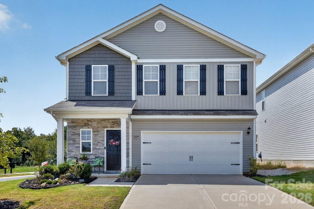 Welcome Home to Stoney Green!Welcome to this beautifully maintained 4-bedroom, 2.5-bathroom home located in the newer Stoney Green subdivision in the north Charlotte area, conveniently situated near UNC Charlotte. Established just two years ago, this community offers the appeal of newer construction while providing easy access to shopping, dining, major highways, and everything the Charlotte area has to offer.  Step inside to a bright, open-concept floor plan designed for comfortable everyday living and entertaining. The main living area features an inviting electric fireplace, creating a warm focal point for family gatherings. The spacious kitchen offers a large island with seating for four, making it the perfect place for casual meals, morning coffee, or gathering with friends and family.  Upstairs, you'll find four comfortable bedrooms along with the convenience of a second-floor laundry room, keeping everyday chores close to where they are needed most.  Situated on a desirable corner lot, this home also offers a fully fenced backyard with added privacy and space to enjoy the outdoors. Behind the fenced yard is a cul-de-sac, helping provide a quieter setting with minimal traffic immediately behind the home.  Modern living is made easy with smart-home features throughout, including smart lighting, locks, and thermostat controls. The attached garage is also equipped with an EV charger, adding an excellent touch of convenience for today's homeowner. Well maintained and thoughtfully designed, this home is truly move-in ready and waiting for its next family. Come experience all that this Stoney Green home has to offer!