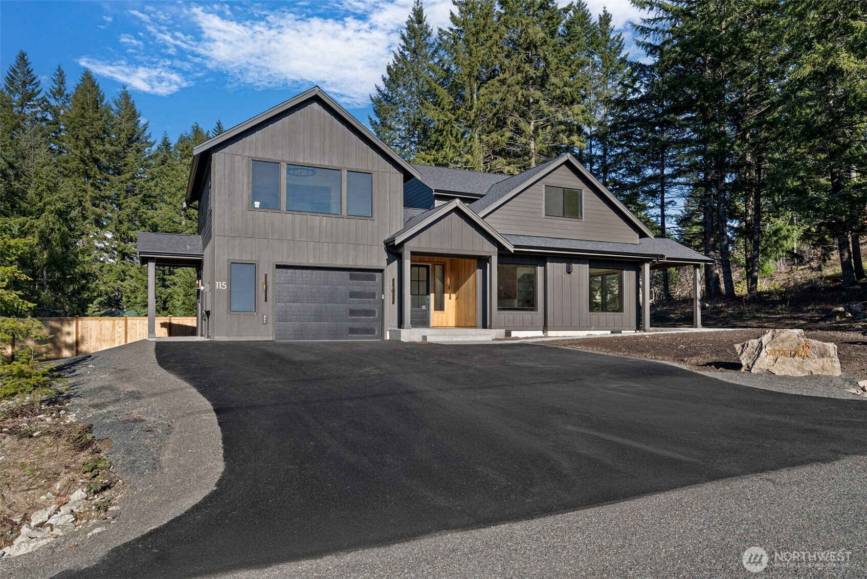 Ski White Pass, hike, walk to Cowliz river & town. Resort lifestyle elevated in new home on large dead end street lot w/2 primary suites, attached ADU above garage & the best of indoor/outdoor living. Designer selections throughout. Wood accent entry wall, metal & glass barn door to mudroom/laundry. High grade LVP, great room w/gas linear fireplace w/floor to ceiling large format tile. Slider to outdoor covered living, wood ceiling, prewired for heater and hot tub. Kitchen w/custom thin shaker trim cabinets, Quartz counters, full height tile backsplash, GE Café appliances & custom wood gas range hood. Showstopper open pantry w/floating shelves, window & counter to ceiling tile backsplash. Main level primary ensuite w/floor to ceiling tiled walls, shower bench & large closet. Guest bath w/acoustic wood accent wall, Upper level 2nd primary w/peek-a-boo downtown Packwood view, blt-ins, walk-in closet & ensuite w/full tile shower & glass barndoor. Addtl bdrm, full bath & spacious loft. Separate slate entrance to ADU, ideal for rental, guests & addt'l space w/vaulted ceiling, view, wagon wheel chandelier, breakfast bar, custom cabinets, undercounter fridge, combo micro/airfryer/convection, bdrm w/closet & bath w/tile surround shower. High end features, 10' ceilings on main, 8' on 2nd level, wired for EV, designer LED lighting, hardware & surfaces. Lrg, partially fenced lot, patio & firepit. Watch Elk, Eagles & wildlife from this one-of-a-kind home built by local builder.