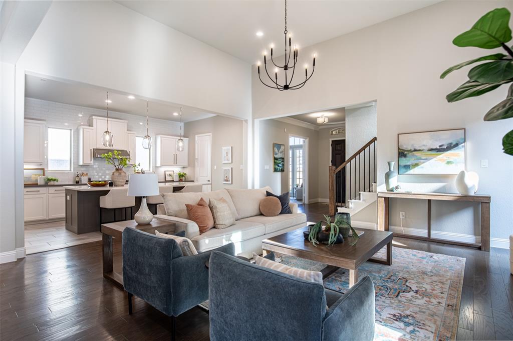 LOVE WHERE YOU LIVE. Experience a resort-style, fitness-forward lifestyle at 7205 Avondale Dr, tucked into the highly sought-after Trails at Craig Ranch. This impeccably maintained 3,170 SF home features 3 bedrooms, each with private bath access, and a versatile first-floor study that easily functions as a 4th bedroom. The classic brick exterior is framed by custom stone borders, professional landscape lighting, overlooking expansive premier lot green space. Inside, natural light floods the open-concept living area, highlighting sleek engineered hardwoods and a chef’s kitchen that serves as a true showstopper. With quartz countertops, full-width pot & pan drawers, and a stunning tile feature wall that reaches the ceiling to frame, this home is built for both daily life and high-end entertaining. Wellness is a way of life here, as you are just a short stroll from the 100,000-square-foot Life Time Fitness luxury destination. Members can enjoy 12 lighted outdoor pickleball courts, a heated 50-meter outdoor lap pool for year-round swimming, and executive locker rooms with saunas & steam rooms. For the golf enthusiast, you can walk to TPC Craig Ranch, the proud host of the PGA TOUR’s CJ CUP Byron Nelson. Every May, the neighborhood comes alive as the CJ CUP Byron Nelson brings the world’s top golfers and a celebratory tournament energy to your doorstep. Walk, cycle or drive to District 121 and HUB 121; vibrant destinations featuring a curated collection of chef-driven restaurants, craft breweries & expansive outdoor patios. Grab a patio seat for live music or explore diverse local flavors. Built by Ashton Woods (Newsweek’s 2025 Most Trustworthy Builder) located in A-rated Frisco ISD. Just steps away, Dr. Kenneth Cooper Park offers a premium half-mile rubberized track designed for a joint-friendly workout in a serene, wooded setting. Dog Park. Playground. Floor plan online.