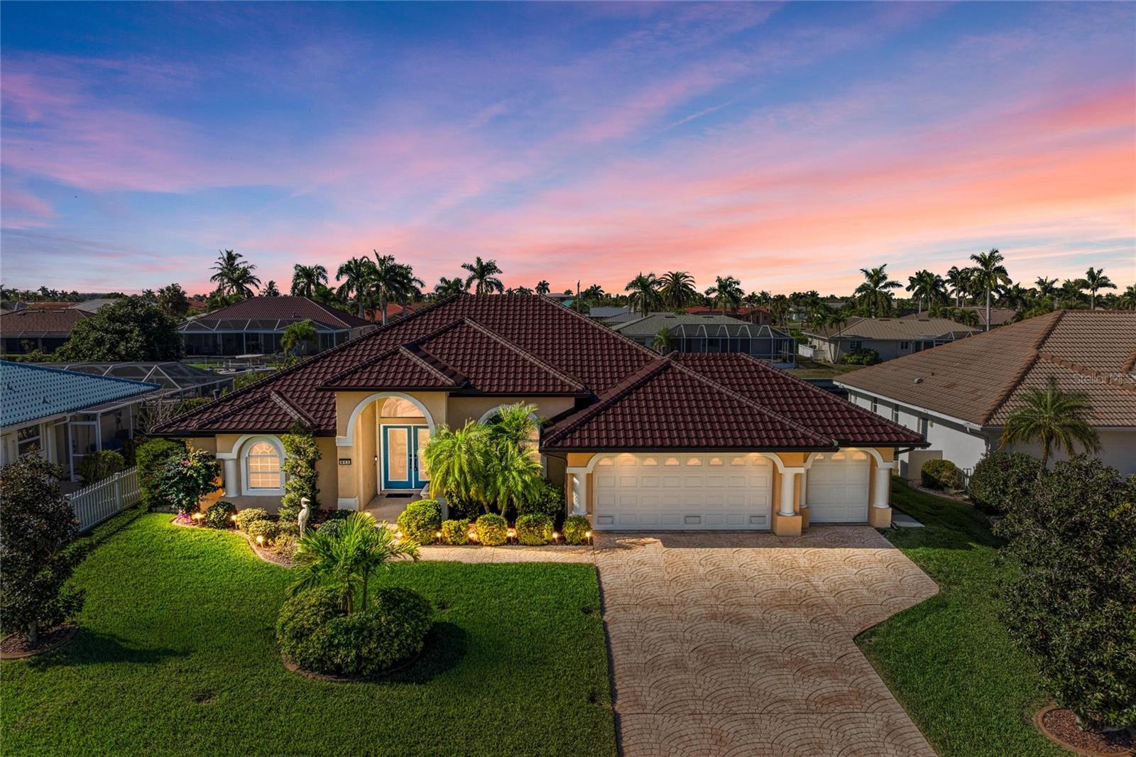 Stunning Remodeled Waterfront Pool Home in Punta Gorda Isles – Sailboat Access!Don’t miss this exceptional 3-bedroom, 2-bathroom, 3-car garage waterfront pool home located in the heart of Punta Gorda Isles, one of Southwest Florida’s most sought-after boating communities. Perfectly positioned on a wide canal with fast access to Charlotte Harbor and the Gulf, this meticulously maintained residence offers the ideal blend of luxury, functionality, and Florida lifestyle.This home features a new stone-coated steel metal roof, full hurricane protection, NEW HVAC, luxury vinyl plank flooring, and quartzite countertops, offering peace of mind and modern coastal style. From the moment you arrive, the manicured landscaping and architectural details showcase pride of ownership.Inside, enjoy an open split floor plan with vaulted ceilings and abundant natural light. The expansive great room features a wall of sliding glass doors that open seamlessly to the covered lanai and heated waterfront pool, creating effortless indoor-outdoor living. The private primary suite offers dual walk-in closets with custom organizers, direct lanai access, and a spacious en-suite bath with dual vanities, soaking tub, and walk-in shower.The kitchen is designed for both entertaining and everyday living, featuring generous cabinetry, ample prep space, breakfast bar, coffee station, and dinette with aquarium windows overlooking the pool and canal. A formal dining room with tranquil garden views adds flexibility for hosting guests. Two spacious guest bedrooms provide excellent closet space and natural light, with one currently used as an office featuring sliders to the pool and canal views. A pool bath offers convenient lanai access.At the water’s edge, boaters will appreciate 82 feet of city-maintained concrete seawall, over 60 feet of concrete dock, and a boat lift with water, electric, and fish-cleaning station—ideal for serious boating enthusiasts. Additional highlights include a large laundry room with storage, a 3-car garage with decked attic space, 10.5’ elevation, and transferable flood insurance. Furniture available separately.Located minutes from downtown Punta Gorda, Fishermen’s Village, golf, pickleball, shopping, dining, weekly farmers markets, and golf-cart friendly streets—this home truly has it all. Priced to sell—schedule your private showing today and start living the Punta Gorda Isles waterfront lifestyle.