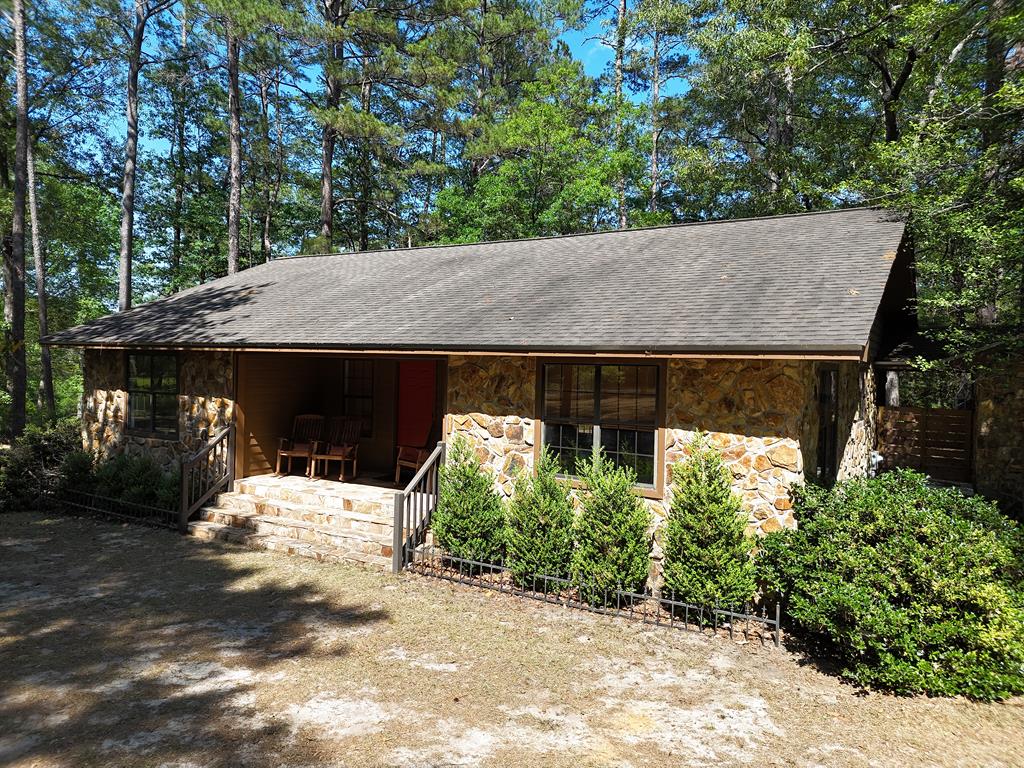 10 Acres of Quiet Country Living – South Grady County Near Florida Line.  Enjoy peaceful living at 431 Beth Page Rd., Thomasville, just seconds from the Florida line. This scenic 10-acre property offers a private, park-like setting near Birdsong Nature Center, several plantations, and Lake lamonia. The 2300 sqft, 2BR/1.5BA home features a living area, large rec room, and a well-appointed kitchen with real wood cabinets, refrigerator, stove, dishwasher, and a serving bar for entertaining friends and family. A flexible dining space could serve as a keeping room. The rec room was previously used as a guest suite. The master bedroom suite includes a private screened porch with beautiful views of the rolling acreage. Relax in your rocking chair on the front porch or back deck and take in the peaceful surroundings. Pole barn included. Property is enrolled in a conservation tax covenant. Virtual Tour Address: https://my.matterport.com/show/?m=428EF6ESm7N&mls=1
