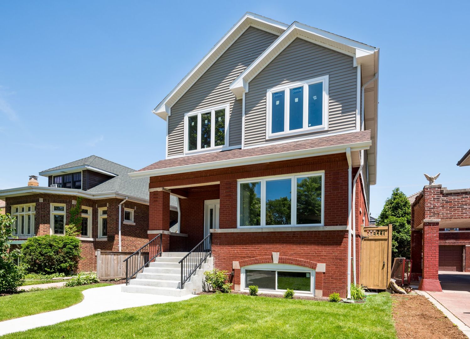 WOW! Absolutely stunning 2-story home in a PRIME CHICAGO LOCATION near Old Irving. Consider this NEW CONSTRUCTION with a completely rebuilt 1st & 2nd floor. Not your typical renovation - this home is loaded with HIGH-END FINISHES and incredible attention to detail.    Enjoy over 4,000 SQ FT of living space with HIGH CEILINGS and an OPEN FLOOR PLAN. The chef's kitchen features VIKING APPLIANCES, large island, and sleek white-on-white design. Includes 4 SPACIOUS BEDROOMS and 3.5 LUXURIOUS BATHROOMS, including a DREAM MASTER SUITE.    Highlights: crown molding, wainscoting, skylights, designer lighting, granite countertops, hardwood floors, porcelain tile, and laundry on both 2nd floor and lower level.    Mechanicals are all newer: ZONED AC & furnace, roof, plumbing, electric, drywall, sump pump, and security system. Energy-efficient windows throughout.    Sits on an OVERSIZED LOT with a HUGE YARD and a 3-CAR GARAGE. Unbeatable PORTAGE PARK location - directly across from a park and close to top-rated schools, shopping, and entertainment.    This home truly has it all - luxury, space, location, and quality. A MUST SEE!