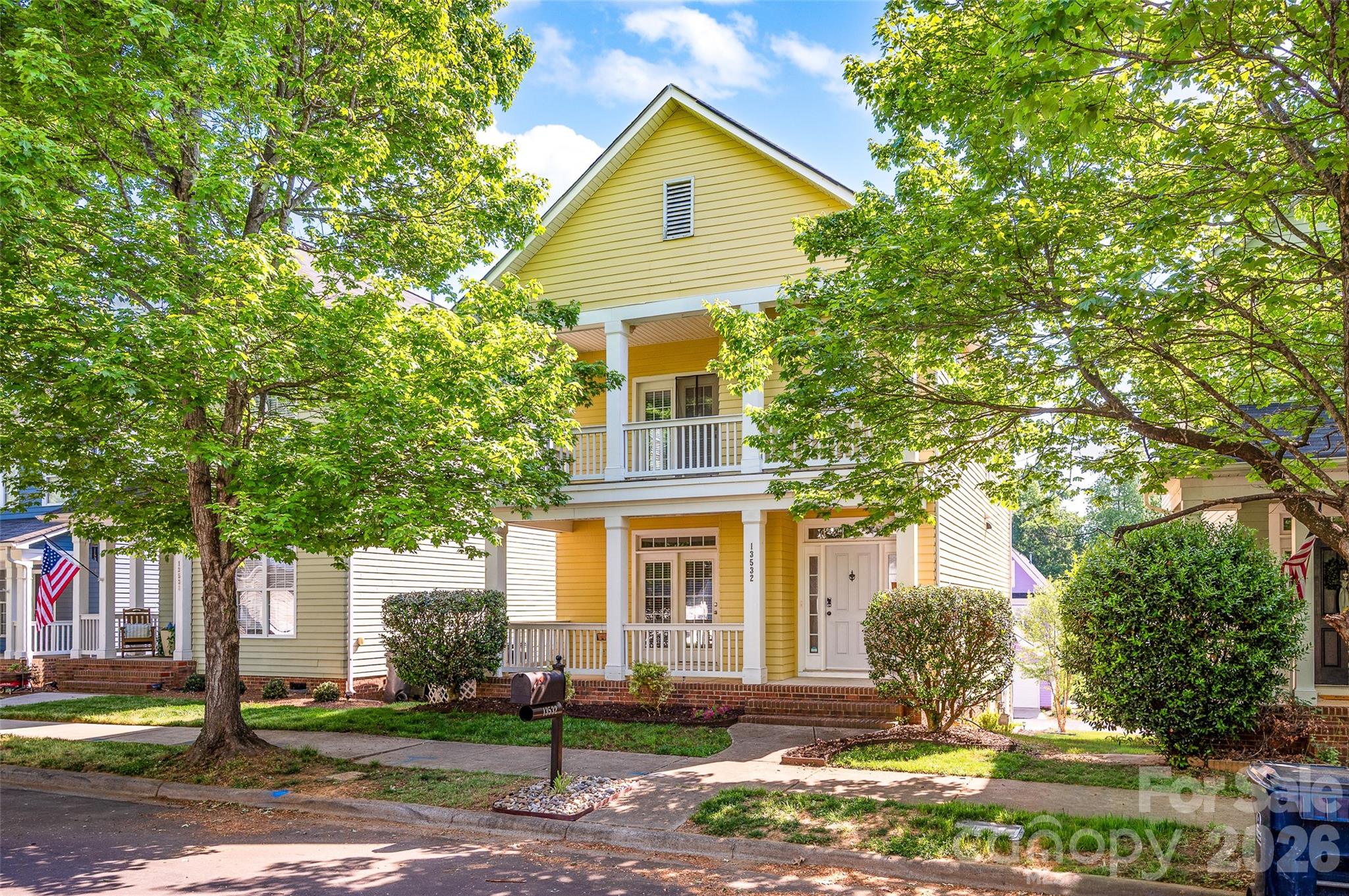 Enjoy the charm and nostalgic feel of this Charleston-style community; With its classic layout and generous room sizes, you’ll love to call this well-maintained home your own; Behind the mature tree line along the road is an inviting covered front porch and a covered 2nd floor balcony, either of which would be great for morning coffee and a good book; Lots of light comes thru the tall windows and shines off the 1st floor hardwood floors; Adding to the appeal are the French doors to the front porch off the dining room and the gas logs fireplace in the living room; The updated kitchen features newer granite counters, a tiled backsplash, maple wood cabinets, a wine rack and newer appliances; Did I mention the kitchen pantry, the breakfast bar and the dining area? Newer wood laminate flooring and carpeting on the 2nd floor;  The spacious primary bedroom has a tray ceiling, French doors to the front balcony and a large walk-in-closet; The primary bathroom has a double sink/vanity/mirror combo, a soaking tub and a stall shower; Bedrooms 2 and 3 face the back and are generously-sized; Recent updates to the home include some new paint, the HVAC (2020), the washer and dryer (2021) and the dishwasher (2024); Other features include window blinds, updated light fixtures, a walk-in crawl space and a detached 2 car garage; The community clubhouse and pool are just 2 doors down!