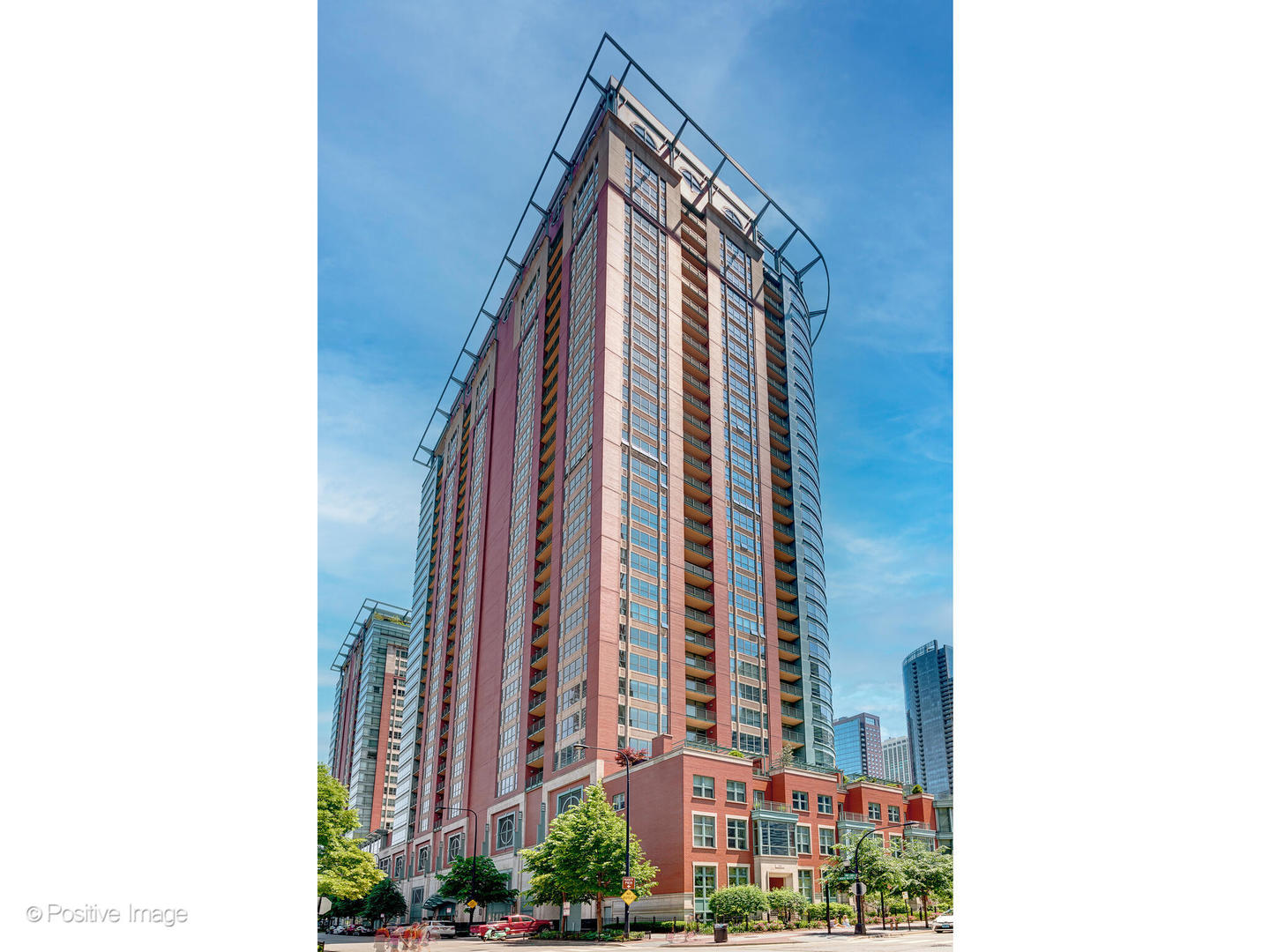 Enjoy breathtaking views from this 3,500 sq ft, 4 bedroom, 3.1 bath penthouse residence at RiverView. This gorgeous corner unit stuns with floor-to-ceiling windows capturing north, east, and west exposures of the skyline, river, and lake. Hardwood flooring flows seamlessly through an expansive, open floor plan. A large formal entryway with ample wall space for an art collection welcomes you home.  Formal living and dining rooms are separated by a two-sided fireplace. A generously sized living room enjoys stunning corner views, while the dining room offers a convenient wet bar with a wine fridge and granite counter. Off the main living space, step onto the first of two balconies, where you'll take in striking views of the river, lake, city, and the iconic Navy Pier. A second west-facing balcony frames additional river and skyline views while offering spectacular sunsets. The living room also opens to the chef's kitchen, making this the perfect place to entertain on a large scale. The kitchen features an extra-large island that easily doubles as a buffet, ample counter space, 42" cabinets, Sub-Zero and Thermador appliances, and a breakfast nook. The 4th bedroom is currently set up as a family room/den, the perfect retreat for a study, movie night, or home office. A massive primary suite occupies its own "wing" of the residence with a graciously sized bedroom, a California Closets custom designed walk-in closet, and an ensuite bath with Whirlpool tub, oversized separate shower, and dual vanity. On the other side of the residence, the second bedroom has an ensuite bath and a custom walk-in closet designed by California Closets. A large third bedroom with a generous closet is conveniently located across the hall from a third full bath with tub/shower. A powder room and laundry room complete the layout.  Two deeded parking spaces are available for purchase for $50K/space. RiverView is a full-service, amenity-rich building offering 24 hour door staff, an exercise room, indoor pool and spa and sundeck. 415 E North Water sits along the riverfront with quick access to the Riverwalk, lakefront path, restaurants, shopping, museums, nightlife, and all that Streeterville has to offe