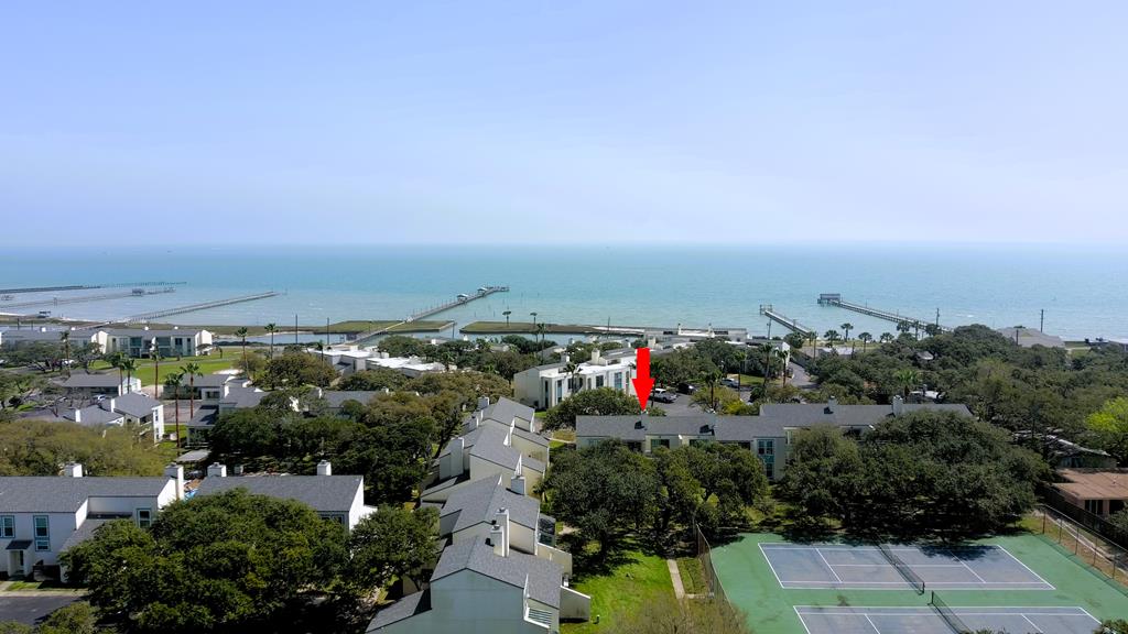 This beautiful, turnkey, fully furnished condo is nestled in a waterfront community off Fulton Beach Rd., with all the amenities you need for your perfect coastal retreat. Enjoy outdoor adventures with private access to a community fishing pier, boat ramp, boat slips, and a sparkling community pool. Inside the condo is designed for comfort and privacy with a split floor plan featuring two bedrooms each with their own en-suite bathroom. The vaulted ceiling in the living room enhances the spacious feel, while the large sliding glass door flood the home with natural light providing serene views of the surrounding trees. Shut the shades and cool off with a new AC installed in December of 2024. Schedule a showing today!