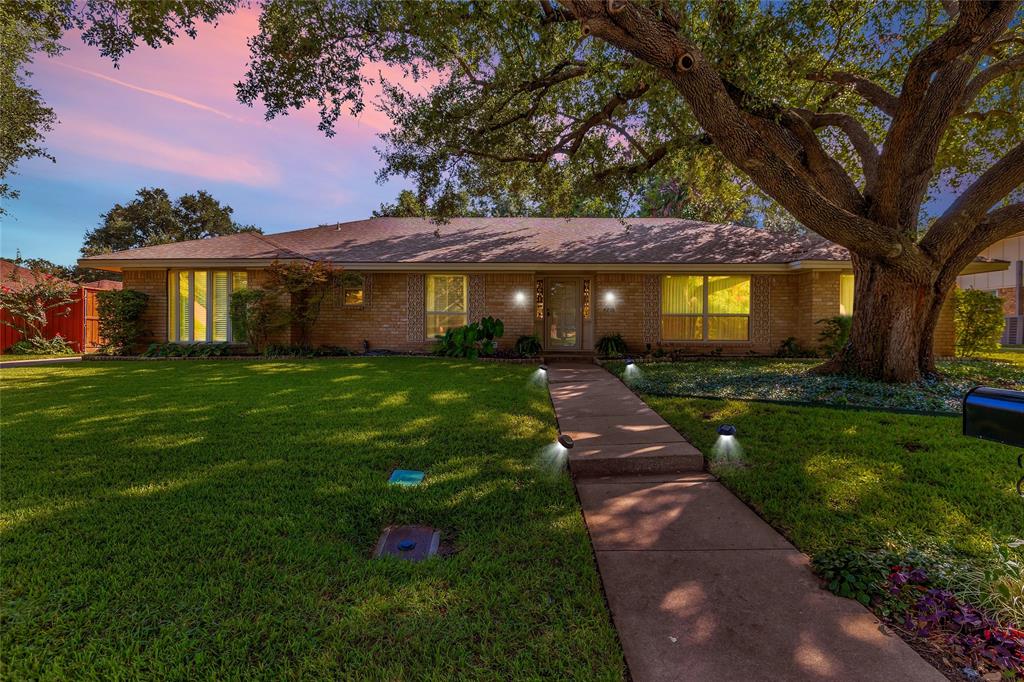 Welcome to this charming one-owner ranch-style home with 4 bedrooms, 2.1 bathrooms and nestled on a large, beautifully manicured lot in a quiet, mature neighborhood. This residence exudes character and timeless appeal, perfectly blending classic features with modern updates.  The kitchen has been thoughtfully updated with new appliances, double ovens, and stunning granite countertops - ideal for cooking and entertaining. The great room features soaring vaulted ceilings and a cozy brick fireplace, creating a warm and inviting atmosphere. Original details like the leaded glass side-lights on the front door add unique charm, while recent updates include replaced windows, upgraded plumbing, and a new HVAC system for added comfort and efficiency. 
The rear entry garage is secured with an electronic gate, providing privacy and convenience. Step outside to the covered back patio, perfect for relaxing or hosting gatherings. This lovely home combines character, comfort, and modern conveniences in a serene setting - an ideal place to call home!  This lovely home is in a quiet neighborhood with large trees and a park nearby.
