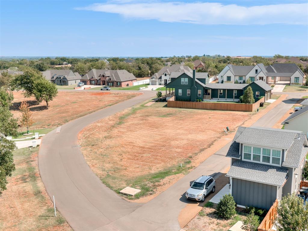 Welcome to Selah, Central Oklahoma's premier New Urbanism community! Located on a prime .13-acre corner lot in the highly desired Sweetwater Village district, this property is the ideal canvas to build your dream primary residence or tranquil second home. Nestled just outside the hustle and bustle of Norman, Selah offers a lifestyle rooted in walkability, front-porch living, and community connection.Step outside your future front door and enjoy miles of nature trails woven through acres of preserved green space and natural ponds. A picturesque stroll connects you to Selah’s vibrant entry district. Enjoy your morning brew at "Sip at Selah" boutique coffee shop, or grab dinner at "Pryor’s Pizza Kitchen," featuring coal-fired pizza, live music, and pickleball. With "The Reserve" event space already open and future expansions bringing a full-service gym, farmer's markets, and boutique shopping, everything you need is right in the neighborhood.Zoned for Washington Schools and conveniently close to I-35, you get small-town charm without sacrificing city convenience. Claim your corner on Memory Lane and design a home where the pace of life slows down on purpose.(custom designs have been made for this lot & available for an additional purchase if desired.)