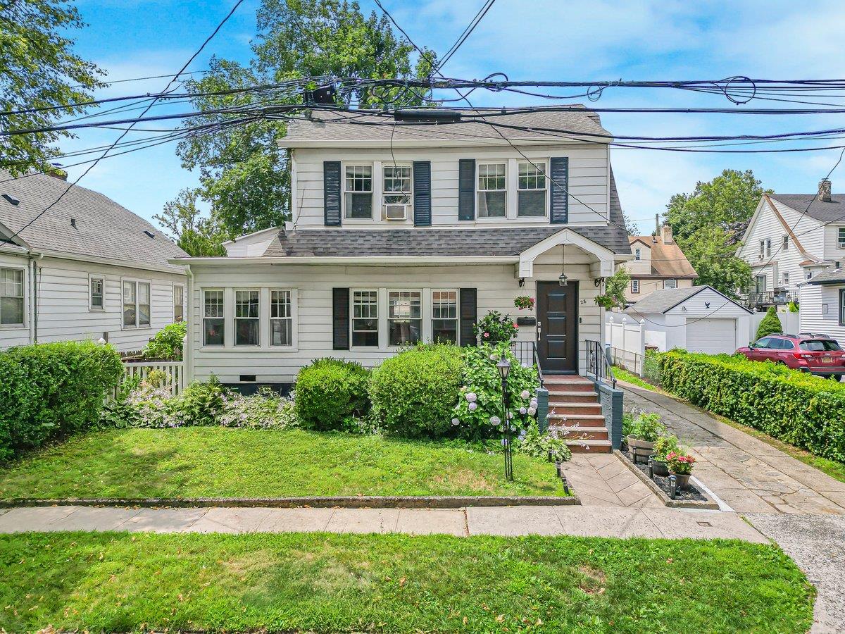 Welcome to 28 Clayton place, a magnificent, newly renovated 3-bedroom, 2-bathroom home, perfectly nestled on a peaceful dead-end street in the highly desirable Lincoln Park neighborhood of Yonkers—a charming suburban enclave in Westchester County just 25 minutes north of Manhattan. This stunning residence boasts a custom gourmet chef’s kitchen, the true heart of the home, complete with a large quartz-topped island, premium stainless steel appliances, sleek cabinetry which flows seamless into the elegant dining area—perfect for both entertaining and everyday living. The inviting living room boasts a cozy fireplace, while a sun-drenched den/ply room adds extra warmth and charm. A gorgeous powder room completes the thoughtfully designed first floor. Throughout the home, you'll find exquisite craftsmanship, including crown moldings and beautifully finished hardwood floors. Upstairs, a wonderful primary bedroom offers double closets, accompanied by two additional generous bedrooms and a charming hall bathroom. The fully finished lower level with its own entrance offers versatile bonus space—ideal for extended family, a media room, or guest accommodations—and includes a luxurious new full bathroom, family room plus ample storage. Recent improvements include the chef's Kitchen, two bathrooms and a high efficiency Gas boiler /Hot water heater. Step outside to your private backyard oasis, where beautifully landscaped grounds and a spacious patio create a peaceful, park-like setting perfect for relaxing or entertaining. A long private driveway, detached garage, and low property taxes further elevate the appeal of this exceptional home. Truly a commuters dream- just minutes from Buses, Trains, Shopping centers and major parkways. A rare blend of classic charm, modern luxury, and convenience, this home is suburban living at its finest.