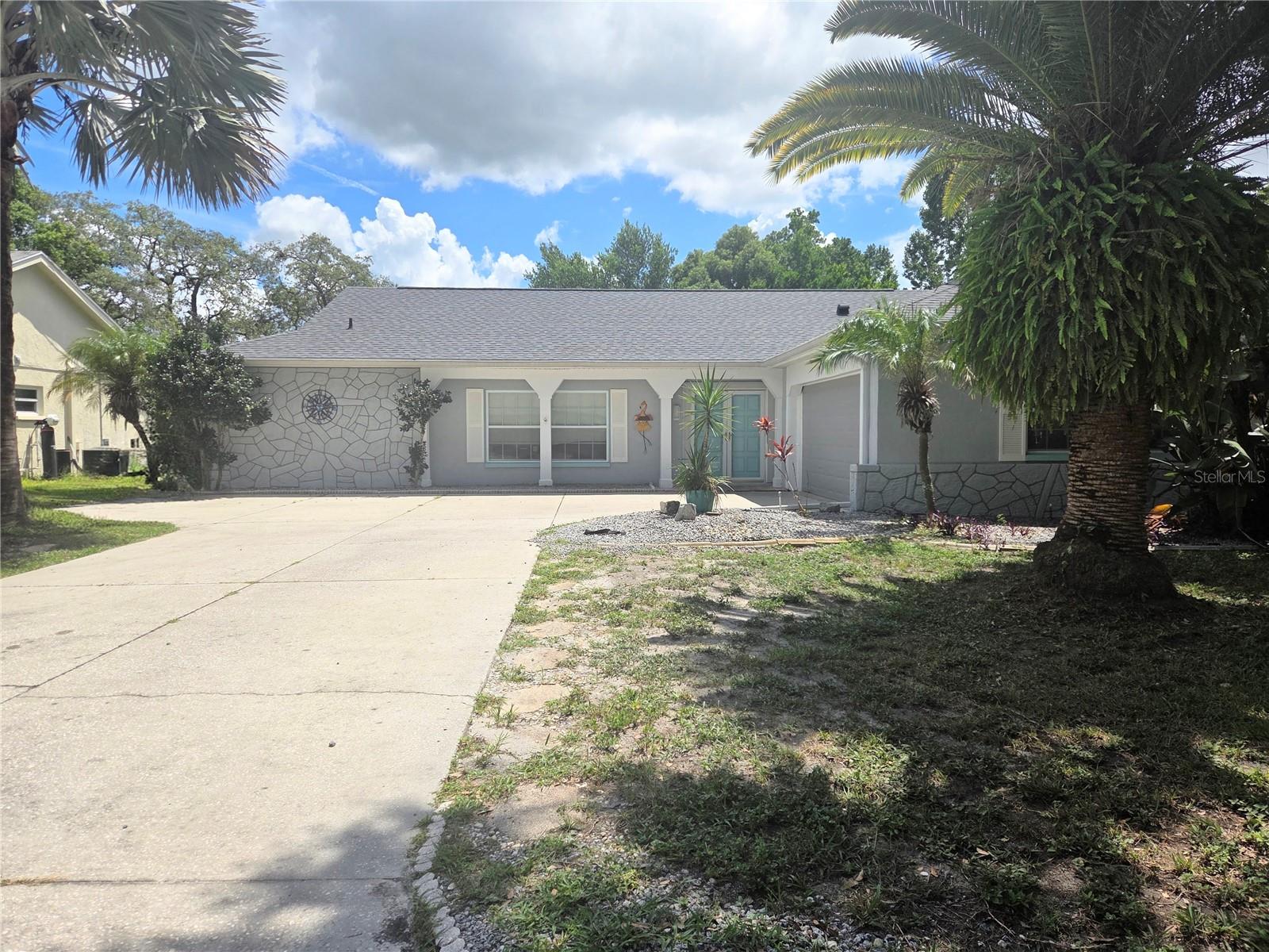 Exceptional value under $300K in the highly desirable Beacon Woods community! This spacious 4-bedroom pool home offers complete peace of mind with a NEW AC (2024) and NEW Roof (2022). Inside, enjoy a functional layout featuring distinct living, family, and formal dining rooms, along with three generously sized bedrooms. An oversized laundry room doubles as a ideal dedicated home office or craft space. Step outside to your private oasis: an impressive 30' x 16' pool surrounded by elegant brick pavers and covered by an upgraded scenic screen enclosure that will remind you you're in paradise. Residents of Beacon Woods enjoy top-tier amenities including a clubhouse, resort-style pool, and tennis courts—all just minutes from local hospitals, shopping, top-rated schools, the public library, and major transit routes. Schedule your private tour today before it’s gone!