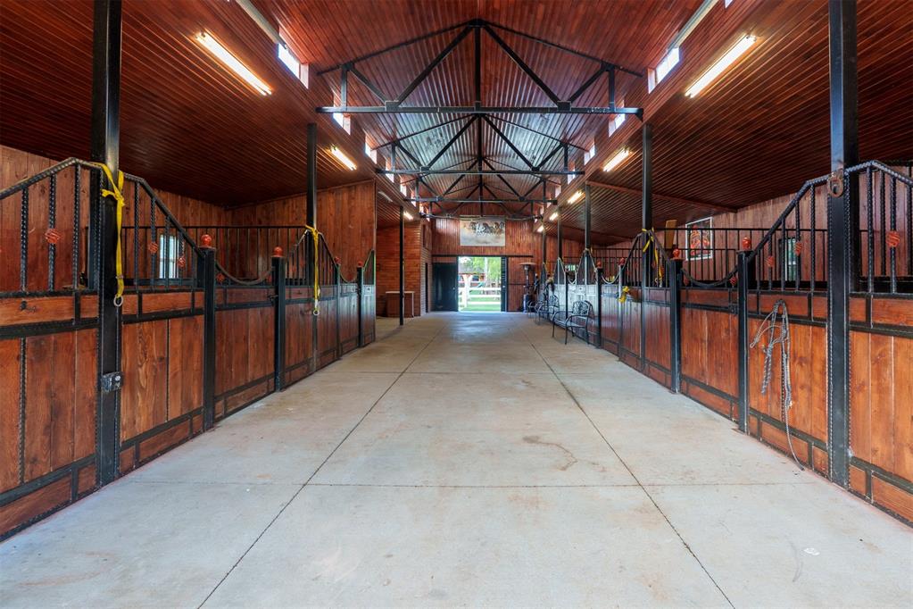 Welcome to the ultimate horse training retreat—just minutes from the University of Oklahoma campus! This Acreage  was designed with equestrian enthusiasts in mind. Featuring functional training spaces, barns, fenced pastures, and room to roam, this ranch is perfect for riding, boarding, or breeding operations. The home offers cozy country charm, updated touches, and beautiful views of the surrounding land. Whether you're looking for a peaceful rural lifestyle or a working horse facility close to Norman’s best amenities, this rare find delivers. Enjoy game day tailgates and golden hour rides—all within 5 minutes of OU. Don’t miss your chance to own a piece of Sooner country!
*8 stalls * Horse bathing pad * Full bath / shower in the horse barn * Horse training walking ring/ hot walker * Large covered patio for entertaing * outdoor pizza kitchen & more. * Bring the chickens & the horses