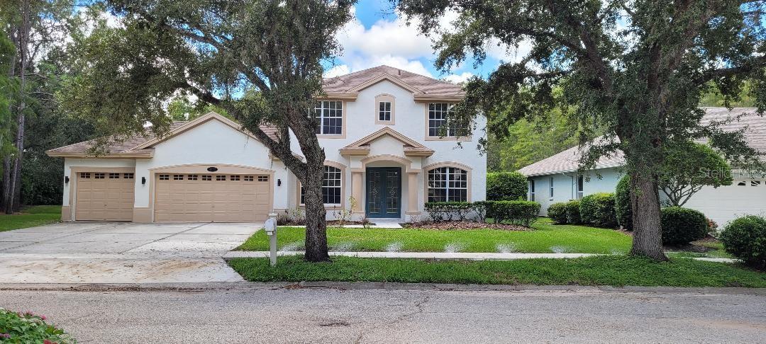 BEAUTIFUL VILLAROSA POOL HOME.  THIS LOVELY 2-STORY HOME HAS BEEN PAINTED INSIDE AND OUT.  THE HOMES MANY AMENITIES INCLUDE:  NEW FRONT AND REAR DOORS, NEWLY REMODELED ISLAND KITCHEN WITH LARGE (6X8) ISLAND-GRANITE COUNTER TOPS, DOUBLE SINK WITH DISPOSAL, STAINLESS APPLIANCES INCLUDING GAS TOP OVEN, MICROWAVE, REFRIGERATOR AND DISHWASHER, DINING AREA OFF THE KITCHEN WITH VIEW OF THE POOL AND CONSERVATION AREA, FORMAL LIVING AND DINING ROOM, GREAT ROOM, NEW SMART THERMOSTATS UP STAIRS AND DOWN, LARGE CAPACITY GAS WATER HEATER, 3 CAR ATTACHED GARAGE, LAUNDRY ROOM WITH WASHER AND DRYER AND LAUNDRY TUB, WALK-IN PATRY OR STORAGE AREA OFF OF THE KITCHEN,  NEW HEAT PUMP IN 2025, NEW LANAI COATING, POOL WITH ENCLOSED SCREENED LANAI, LARGE CORNER CONSERVATION LOT, NEW BRICK PAVER WALKWAY, LARGE UPSTAIRS MASTER SUITE (15X17) WITH A SEPARATE SITTING AREA (7X9) AND BALCONY (8X12) OVERLOOKING THE CONSERVATION AREA, SIT BY YOUR POOL AND WATCH THE DEER WHO FREQUENTLY VISIT THE BACKYARD CONSERVATION AREA.  WALKING DISTANCE TO NEARBY PARK WITH PLAYGROUND, TENNIS COURTS AND PICNIC AREAS.  EASY ACCESS TO VETRANS-SUNCOAST EXPRESSWAY. THIS IS A MUST SEE AND IS READY TO GO.