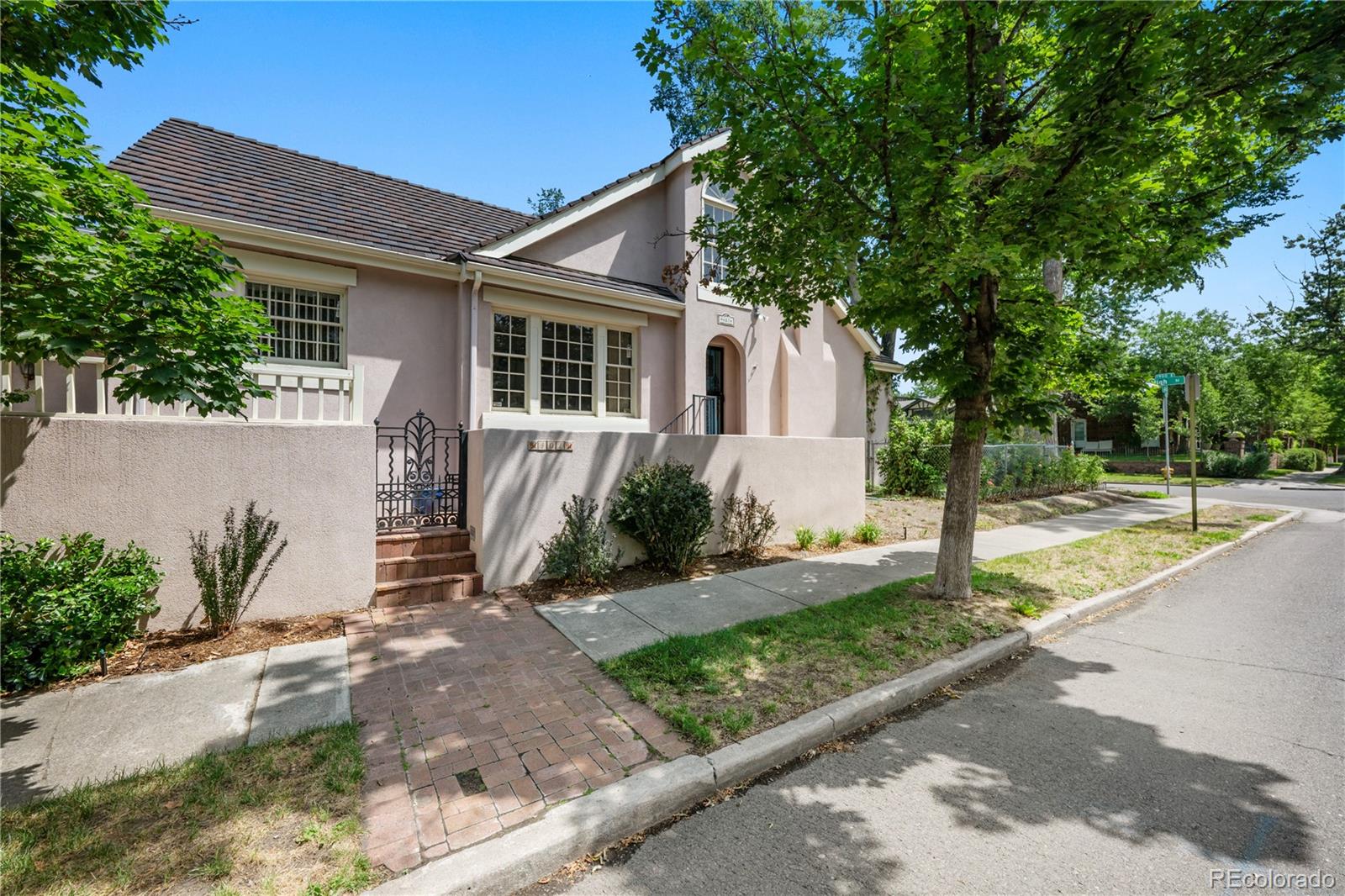 A rare opportunity to own a character-filled home in the prestigious Denver Country Club neighborhood. Rich with original architectural details, this home showcases beautiful historic woodwork while natural light streams through the home's many windows, creating an inviting atmosphere. The thoughtfully separated bedrooms offer a level of privacy rarely found in homes of this era.The inviting courtyard creates a peaceful outdoor retreat with space for entertaining, while the small fenced yard provides just the right amount of space for pets or gardening without extensive maintenance.Offering an exceptional opportunity to personalize, this home's enduring character and premier location make it a truly special property. Whether you choose to thoughtfully restore its historic beauty or reimagine it with modern finishes, this home offers incredible potential in one of Denver's most coveted neighborhoods.The Denver Country Club neighborhood is renowned for its tree-lined streets, timeless architecture, and proximity to Cherry Creek, Wash Park, downtown, and some of Denver's finest dining, shopping, and cultural amenities. This is your chance to create lasting value in an irreplaceable location.Bring your vision and make this unique Denver home your own.