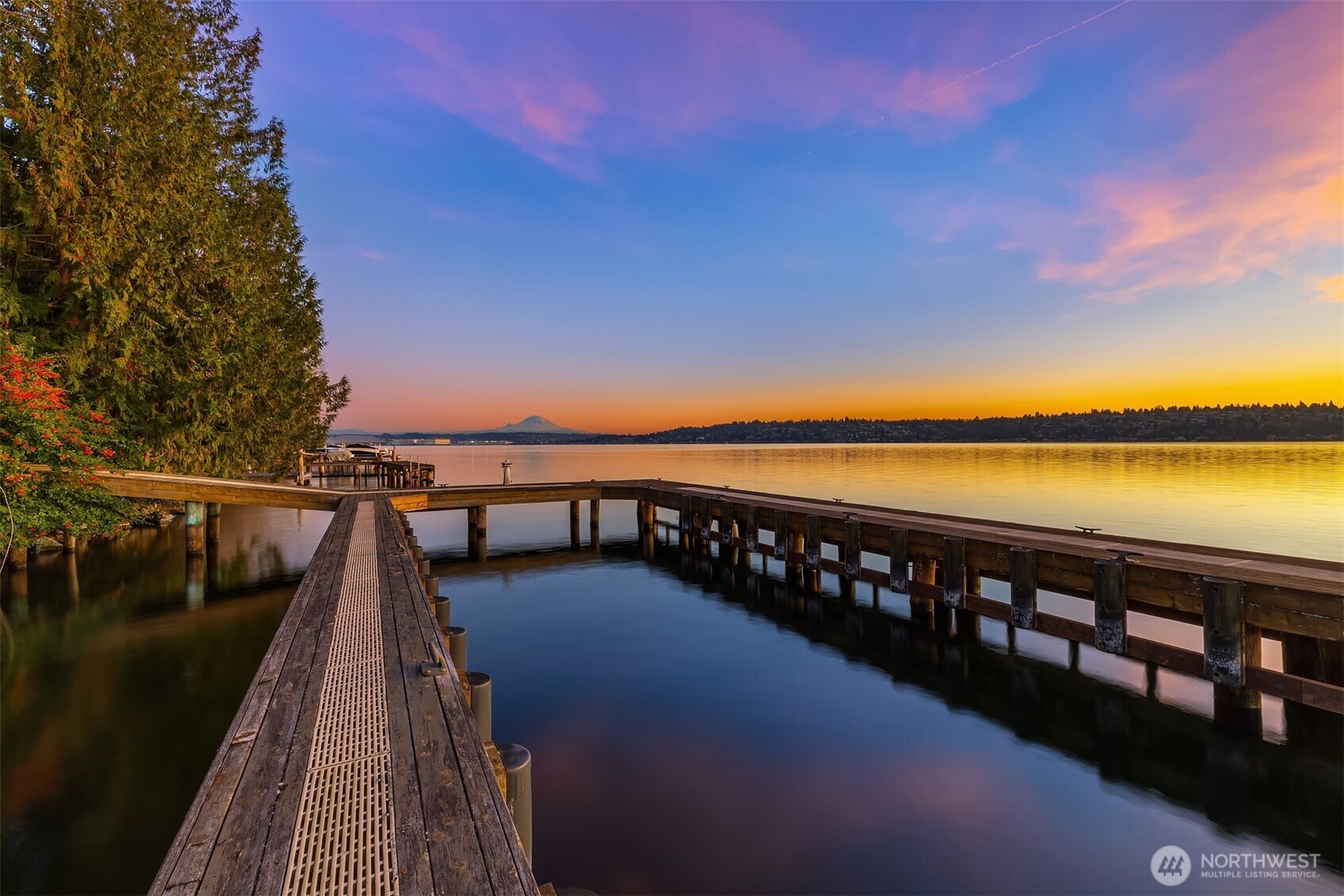 100 ft of private exclusive waterfront.  Finger dock for your 65+ yacht.  Down to the studs, this rare west-facing Mercer Island waterfront opportunity with an irreplaceable grandfathered foundation positioned just feet from the shoreline—a location that could not be recreated under today's regulations.  Private driveway leads to a secluded setting with expansive Lake Washington, Mount Rainier and island views. Feasibility work, survey and due diligence have been completed, offering valuable information for buyers exploring restoration, renovation or redevelopment within applicable regulations. Enjoy extraordinary boating access, stunning sunsets and a peaceful natural setting where eagles soar overhead and wildlife is part of daily life. Additional value includes a first right of offer on the adjacent waterfront property at 8025 W Mercer Way, creating a rare opportunity for a larger waterfront estate assemblage. An exceptional chance to secure one of Mercer Island's most unique waterfront settings.