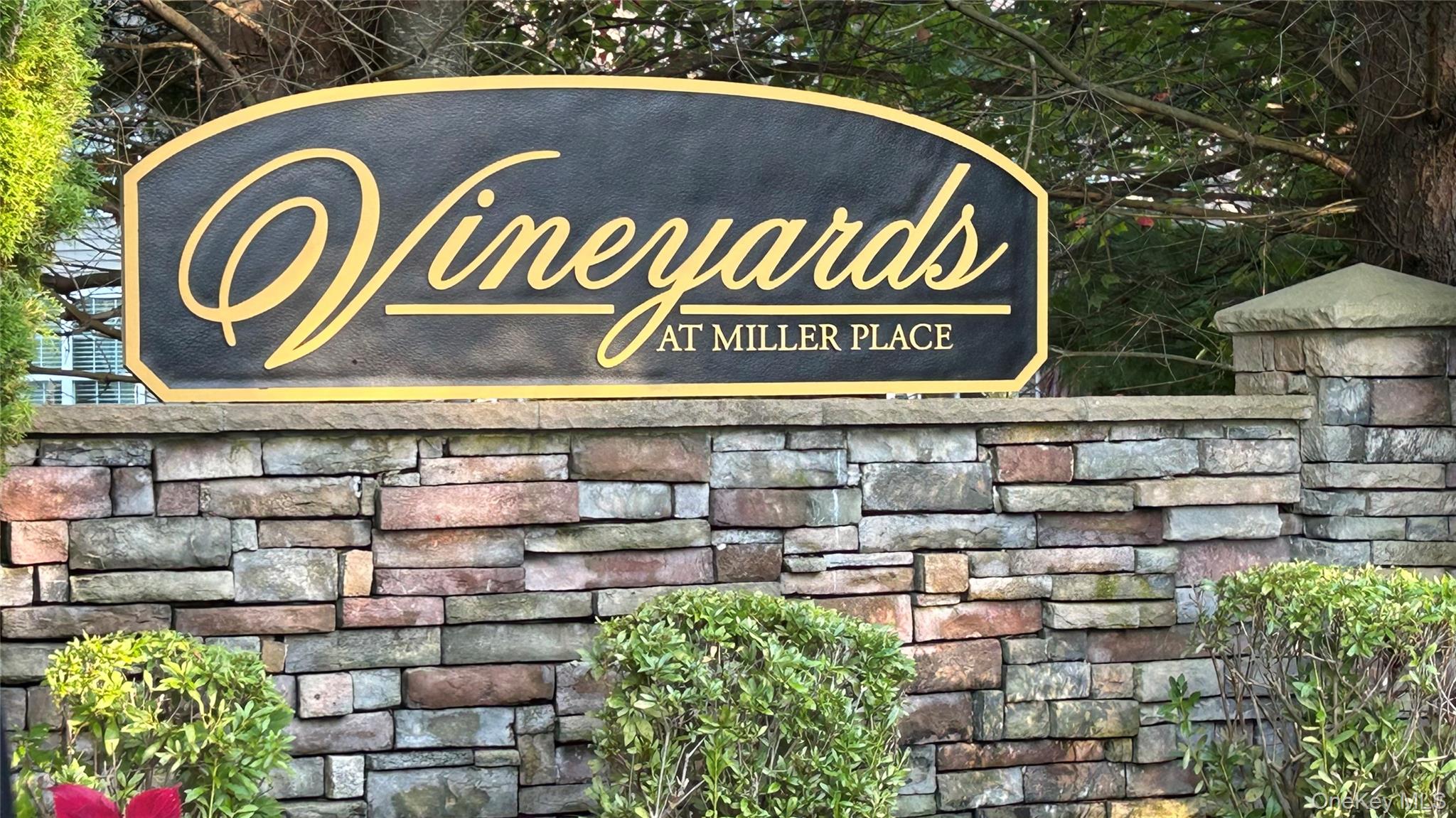Discover easy living in this lovely 55+ condo. Perfectly situated on a quaint cul-de-sac in the desirable Vineyards of Miller Place. Low maintenance living in a well kept community. This home offers the perfect blend of tranquility and accessibility. The Master bedroom is located on the 1st floor with an en suite bathroom. Your friends and family will have room to dine with a Dining area as well as a full Kitchen. Get cozy in the large living room with an easy press of a button gas fireplace. Enjoy lots of extra space with your full unfinished basement. Community amenities include heated saltwater pool, bocce ball, tennis court and a lovely walking path thruout the gated community. Enjoy the best of Long Island's Northshore with easy access to local highways and amenities like Mall and Outlet shopping , vineyards, beaches and boating while living in this private ,peaceful setting. Don's miss out on this opportunity.