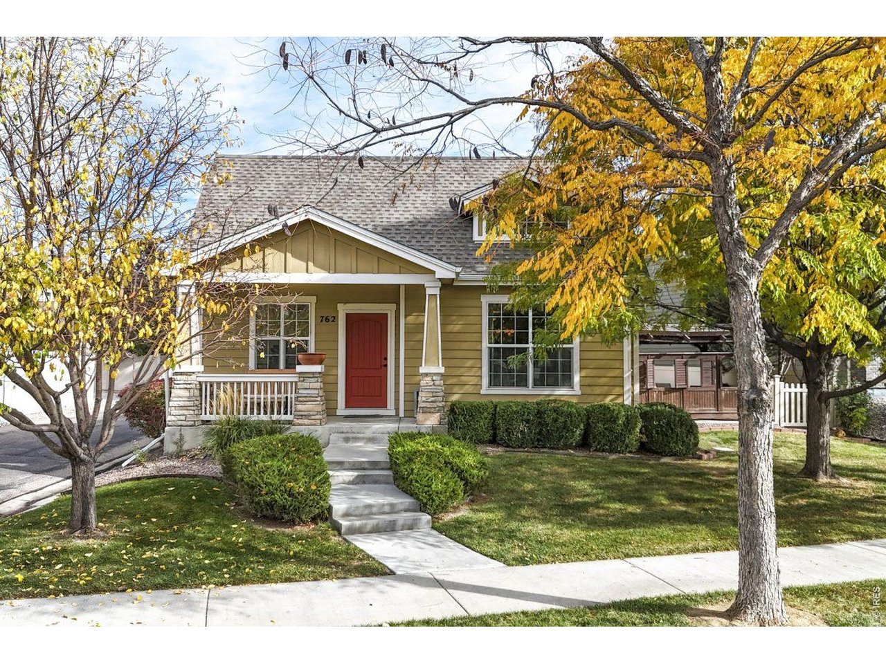 Welcome home to this charming craftsman-style ranch in North Fort Collins, just minutes from Old Town, local breweries, and easy I-25 access. A classic covered front porch sets the tone, and the view looks out over open space across the street.Inside, the open single-level floor plan is filled with natural light. The living area is anchored by a cozy fireplace, and a built-in bar makes entertaining easy. Home cooks will appreciate the gas range in the kitchen. Downstairs, the basement is ready for your vision, with rough-ins already in place for a future wet bar.Out back, the fenced yard and patio with pergola create a great spot for summer evenings and weekend barbecues. A detached two-car garage adds plenty of room for vehicles, bikes, and gear. The HOA handles grounds maintenance, so you can spend more time enjoying the neighborhood park and bike pump track just down the street.Low-maintenance living, a great location, and craftsman character. Schedule your showing today!