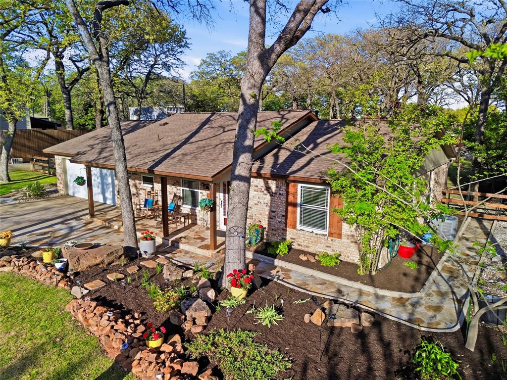 Situated on an expansive, tree-filled lot, this beautifully renovated single-story home offers a rare opportunity to enjoy space, privacy, and value in the heart of Colleyville. Surrounded by mature, towering trees and lush landscaping, the setting creates a peaceful, private retreat while still being close to everything. The outdoor living possibilities here are truly exceptional. Whether you envision adding a pool, creating a garden oasis, or designing a custom outdoor kitchen and entertaining space, this property provides the ideal canvas. It’s a setting that invites both quiet evenings and memorable gatherings. Inside, the home has been thoughtfully updated, offering comfortable, move-in ready living with a clean, modern feel. Combined with the generous lot size, it delivers a unique blend of immediate livability and long-term potential. Located within the highly sought-after Grapevine-Colleyville ISD, this home also offers convenient access to major highways including 114, 121, 360, and 635—making commuting across the Dallas-Fort Worth metroplex seamless. Shopping, dining, and everyday conveniences are just minutes away, while the home itself maintains a quiet, established neighborhood feel. Opportunities like this are becoming increasingly rare—especially at this price point. Schedule your private tour today and experience the potential for yourself.