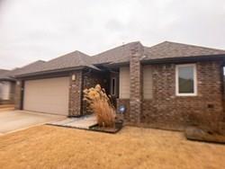 Contemporary 3 bed in Edmond! This home features designer features such as study with glass accent wall and wood floors, interior masonry work in entry, fireplace, master bed, and column by study, and exposed ceiling joists in entry in this one of a kind home.