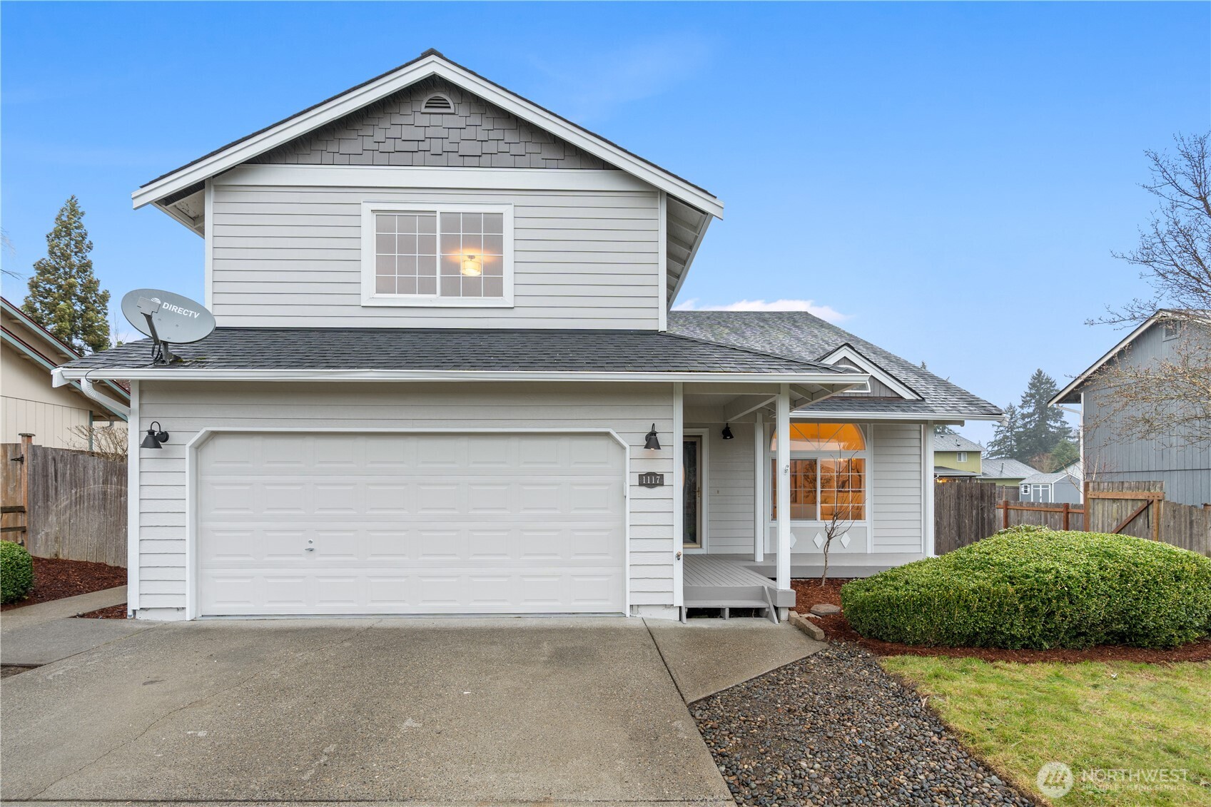 Welcome to this beautifully refreshed residence tucked away on a quiet cul-de-sac in Tacoma’s desirable Parkland area. Thoughtfully updated and move-in ready, this spacious home offers the perfect blend of comfort, style, and everyday functionality.    Step inside to discover a bright, inviting interior featuring brand-new flooring, fresh designer paint, and updated appliances, creating a clean, modern aesthetic throughout. Vaulted ceilings and expansive windows fill the living spaces with natural light, while the flowing floor plan provides both open gathering areas and comfortable private retreats.    The kitchen connects seamlessly to the main living and dining spaces, making it ideal for entertaining or everyday living. Upstairs, the primary suite serves as a peaceful retreat with a private ensuite bath and generous closet space. Additional bedrooms offer flexibility for guests, home offices, or hobbies.    Outside, the large fully fenced backyard sits on an oversized lot, providing ample room for outdoor entertaining, gardening, or play. Whether hosting summer gatherings or enjoying quiet evenings, the outdoor space offers exceptional versatility.    Located just minutes from shopping, dining, schools, and major commuting routes including Highway 512 and JBLM, this home combines modern updates, generous space, and a convenient location.    A rare opportunity to own a beautifully updated home in a quiet cul-de-sac setting.
