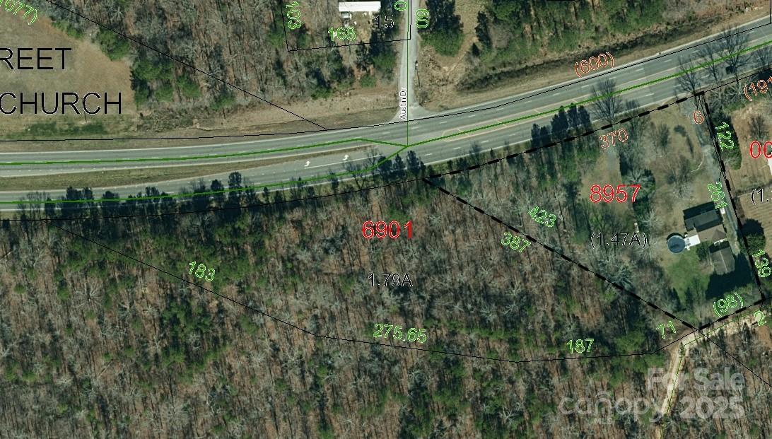 Welcome to the 1.79 acres of residential zoned land that is great for building your home. Looking for residual income? This property has a billboard contract with annual revenue to offset expenses. The billboard does not affect usage of the lot as it is on the far-right front corner of the property line when facing.  Imagine life with direct access to HWY24-27 to travel to convenient shopping, a lake, or nearby cities. Tour this lot to see its great potential! There is a planned solar panel farm behind the property line. 









Behind the property line there is a planned solar panel farm.