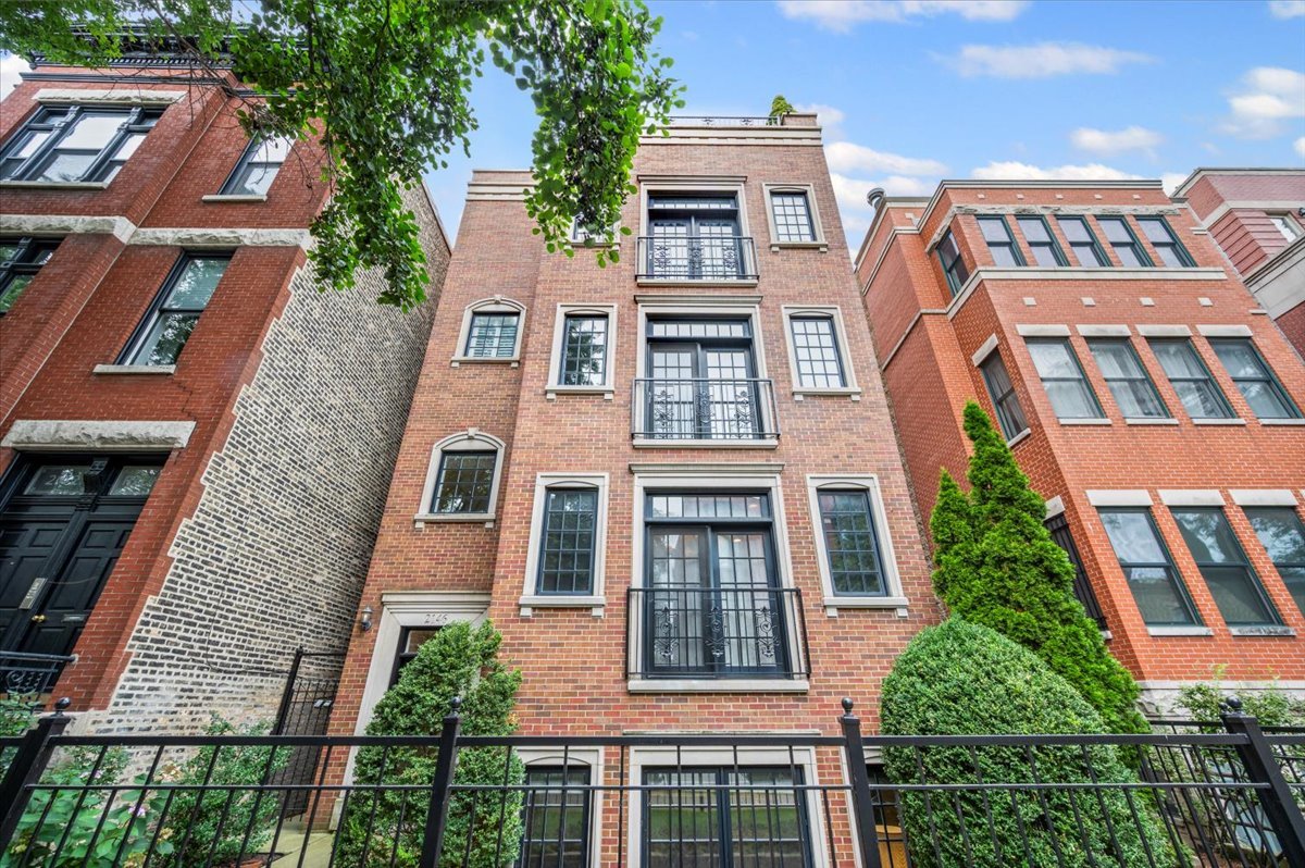 Welcome home to this spacious, extra-wide residence in the heart of Lincoln Park! Set in an all-brick building, this beautiful unit features tall ceilings, crown molding, and heated floors throughout. Open layout with Brazilian cherry hardwood floors, sun-filled living and dining areas, and a custom kitchen with granite countertops, cherry cabinetry, a breakfast bar, and high-end Viking and Sub-Zero appliances. The primary suite includes a large, custom walk-in closet and a ensuite bathroom with steam and rain shower, separate bathtub, plus access to one of two outdoors spaces (which can also be accessed from the hallway as well). Two additional bedrooms include generous closets and share a second full bath. Two outdoor spaces - covered patio located directly off the primary bedroom along with a brick paver patio perfect for entertaining. Located in an AWESOME Lincoln Park location; close to dining, shopping, parks, DePaul, Oscar Mayer, public transit, and everything Lincoln Park has to offer. Exterior parking space included.