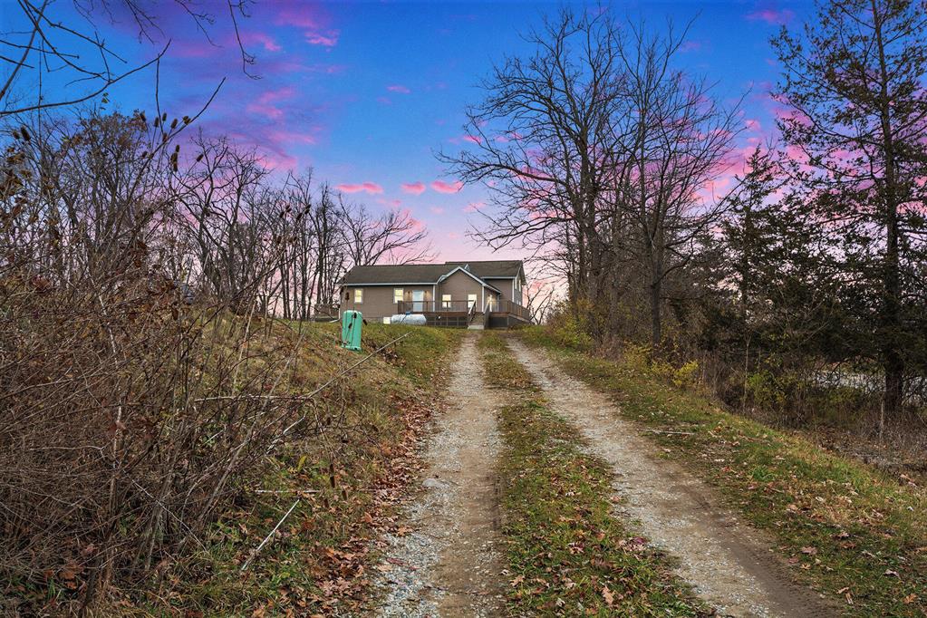 Set on 5.92 scenic acres with private Bean Creek frontage, this completely updated 4-bedroom, 2-bath home offers 1,308 sq ft of modern comfort and peaceful country living. Inside, every surface has been refreshed--featuring brand-new carpet, premium flooring, and stunning granite countertops that elevate the entire home. The layout provides bright, inviting living spaces, generously sized bedrooms, and two fully updated baths. Outside, the nearly six acres offer room for trails, gardens, animals, or simply open space to enjoy, while the creek provides the perfect backdrop for relaxation and outdoor fun. Turn-key, stylish, and set on a beautiful piece of land--this property is truly a must-see.