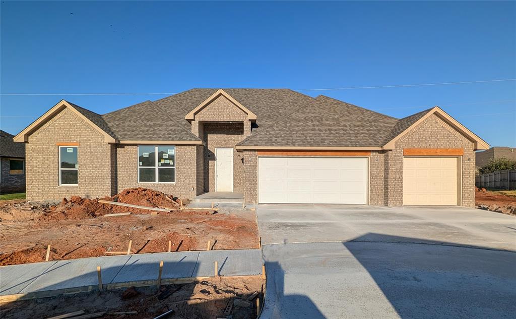 From the moment you step inside, this 4-bedroom home feels bright, open, and generously proportioned, with high ceilings, abundant windows, and a split-bedroom layout that makes excellent use of the space. The main living areas flow together easily, with tile flooring throughout and a kitchen that stands out with plenty of room for prep, serving, storage, and everyday gathering. Tucked away on its own side of the home, the primary suite offers added privacy along with a separate shower, soaking tub, and a spacious walk-in closet with its own window for natural light. The secondary bedrooms are positioned on the opposite side of the home, while a large utility room and 3-car garage add valuable storage and everyday function. Outside, a substantial covered back patio extends the living space, and covered front porch's high ceiling creates an impressive entrance; full sod and a sprinkler system finish out the yard and make exterior upkeep simple.Please note: Listing agent is related to seller.