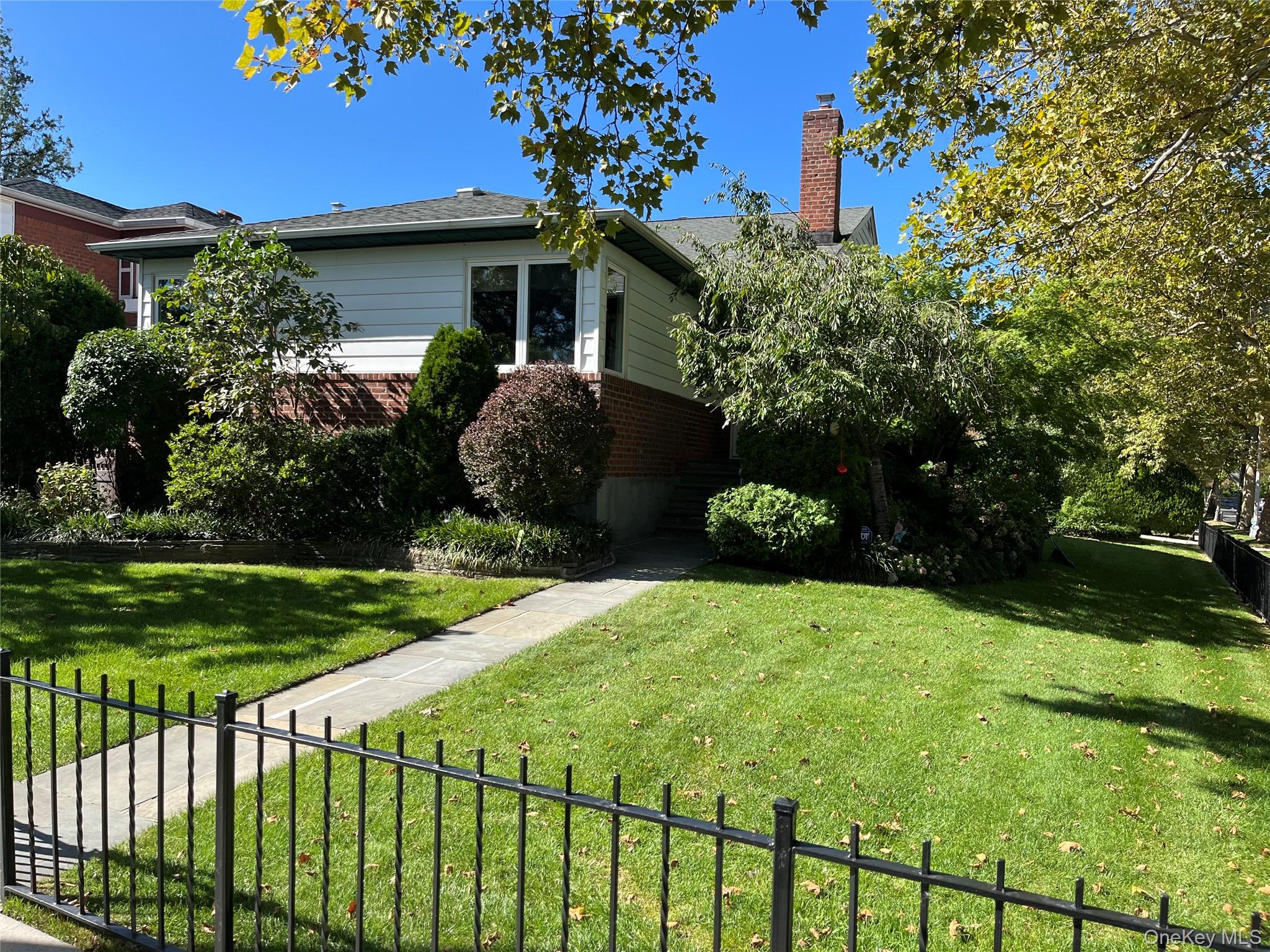 Quad Split Parker Home!Facing South! Good Feng Shui.Mother /Daughter arrangement.Walk to park. Walk to Bay TerraceMajor upgrades 2012-2015 and continuing.Mature landscaping, Peach tree, grapes.Major security features, Window guards plus ADT.Ground floor apartment, insulated with separate bathroom.Completely finished basement with Sauna, soundproof windows, Quiet rock ceiling,Extra electric and outlets.Could run a  business on ground floor.Ground floor laundry room.No Asbestos!All windows and doors replaced. New sidewalk/Driveway. New Bluestone patioUpgraded and replaced Electric and Plumbing.New Garage roof, door and opener.New water heater 6/2023Electrolux and Kitchen aid appliances, Bertazzoni oven. Sakura Vent.