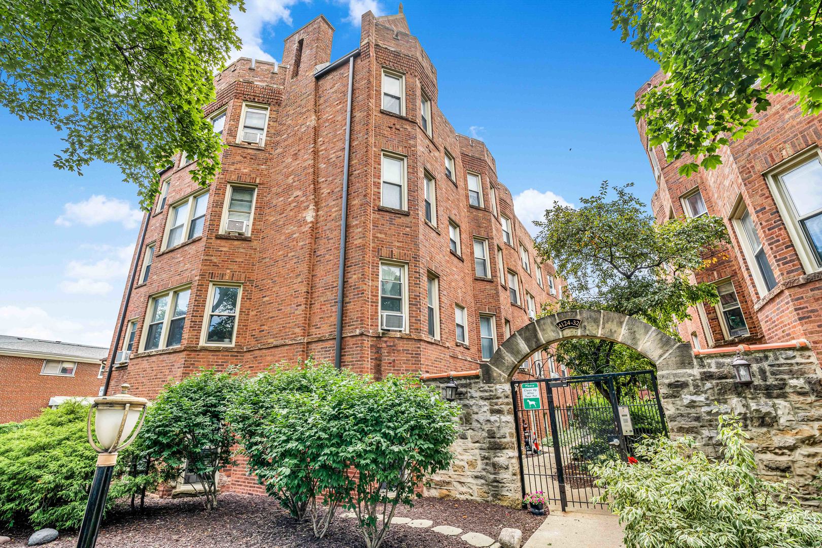Introducing this beautifully updated one-bedroom condo, tucked inside a secure, gated vintage courtyard building full of timeless character. Freshly painted and move-in ready, this spacious home features gleaming refinished hardwood floors, elegant crown molding, and charming arched doorways throughout.    The generous living room and separate dining area offer the perfect blend of comfort and function. The updated kitchen boasts granite countertops, ceramic tile flooring, and plenty of cabinet space for all your storage needs.    Additional features include private storage, a dedicated bike room, and convenient on-site laundry. A new boiler was installed in 2021, and your low monthly assessment covers heat, gas, water, exterior maintenance, and trash collection-adding incredible value.    Located just minutes from parks, schools, churches, and a wide selection of local restaurants with outdoor seating. With easy access to I-90/94, the Metra, and the Irving Park Blue Line, this is a commuter's dream-perfectly positioned between downtown and O'Hare.    Don't miss this unbeatable combination of charm, convenience, and value-schedule your showing today!