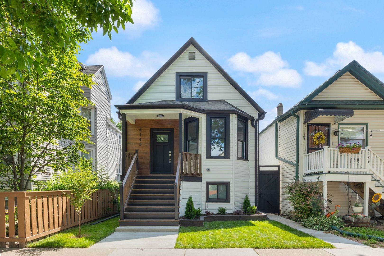 Step into this fully gut-renovated 3+1 bedroom, 2-bath stunner in the heart of Irving Park on an extra-wide lot - where charm meets modern luxury. Everything is brand new in this 2024 rehab: appliances, furnace, AC, windows, laundry, electric, copper in the kitchen and bathrooms  - the works. Main level boasts gleaming hardwood floors, a stylish full bath, and an open, sun-soaked layout with effortless flow from the warm and inviting living room into a reimagined chef's kitchen - perfect for hosting, cooking, or simply enjoying your morning coffee on the back deck. Upstairs, the oversized primary bedroom offers serious flex space and its own deck-with enough room inside to add a third bath, a massive walk-in closet, or the ultimate work-from-home office. The finished basement adds even more value and space, with a cozy family room, sleek full bath, large laundry area, utility sink, and tons of storage. Out back your gorgeous fenced-in yard-lush and green, is ready for summer hangs. Fire pit, garden, party central-you name it. And don't miss the full-size 2-car garage. This is a move-in ready Chicago classic reimagined with care, style, and quality craftsmanship. Come see it today.