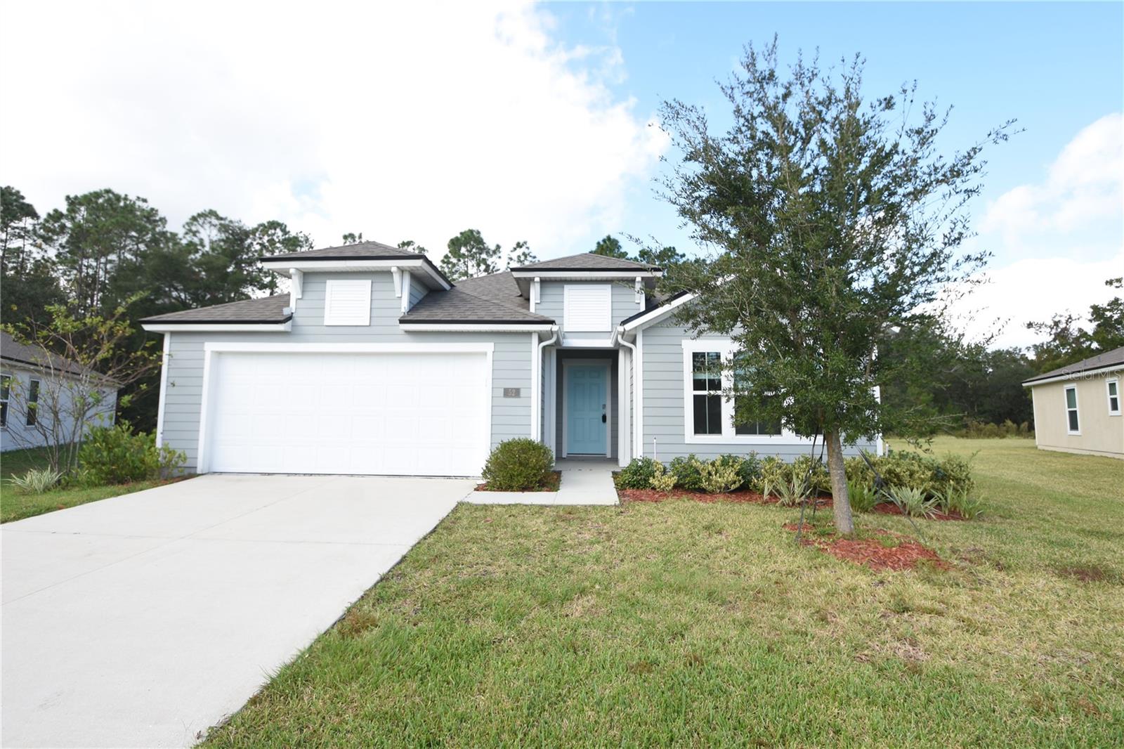 RARE OPPORTUNITY – 2.99 ASSUMABLE VA LOAN AVAILABLE TO ELIGIBLE VA BUYERS! Why wait to build when you can move right into this beautiful, nearly new DR Horton Lantana model home? Offering 3 spacious bedrooms, 3 full bathrooms, and a versatile flex room/office, this thoughtfully designed home combines modern comfort, style, and functionality.Perfectly positioned on a premium, fully fenced lot backing to a peaceful natural preserve, this property offers exceptional privacy with no rear neighbors! Step inside to discover soaring 10-foot ceilings, elegant tray ceiling details, and a bright, open-concept floor plan ideal for both everyday living and entertaining.The spacious kitchen is the heart of the home, featuring beautiful Craftsman-style cabinetry, granite countertops, stainless steel appliances, and an oversized center island perfect for gathering with family and friends. The generous primary suite offers a relaxing retreat with dual vanities and a spacious ensuite bathroom. Two additional bedrooms and full bathrooms provide plenty of room for family and guests, while French doors lead to a private office or flex space.Enjoy your fully fenced backyard overlooking the tranquil preserve, offering the perfect setting to relax or entertain. Residents also enjoy wonderful community amenities, including a clubhouse and swimming pool.Conveniently located just minutes from shopping, dining, and everyday essentials, with easy access to I-95, approximately 20 minutes to historic downtown St. Augustine and beautiful area beaches.THE BEST PART? Qualified VA buyers may have the opportunity to assume the existing VA loan at an incredible 2.99 interest rate, subject to lender/servicer approval and assumption requirements! An exceptional opportunity to own a move-in-ready home with a potentially significant financing advantage. Schedule your private showing today!