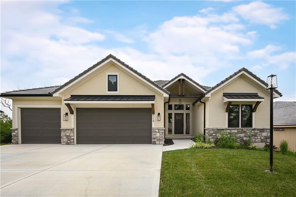 Custom Home now complete and ready for Move-in! Opportunity Knocks for NEW Build Construction with Walker Custom Homes in the newly expanded community of Lake Winnebago.  Modern Reverse Story Home with Tile Roof backing to trees with short walk to Lake. Enjoy this maintenance provided area with build by Walker Custom Homes which is one of the premiere builders who has built many custom homes at Lake Winnebago.  Here is your chance to enjoy all that Lake Winnebago has to offer with a newly expanded lake, skiing/wakeboard options, yacht club dining , sailing, or just chance to enjoy the views! (maintenance fee is $250/mo & includes lawn mowing, edging, seasonal treatments, irrigation/sprinklers, common area with gazebos and dock slips, and one free pontoon for use by sign up)