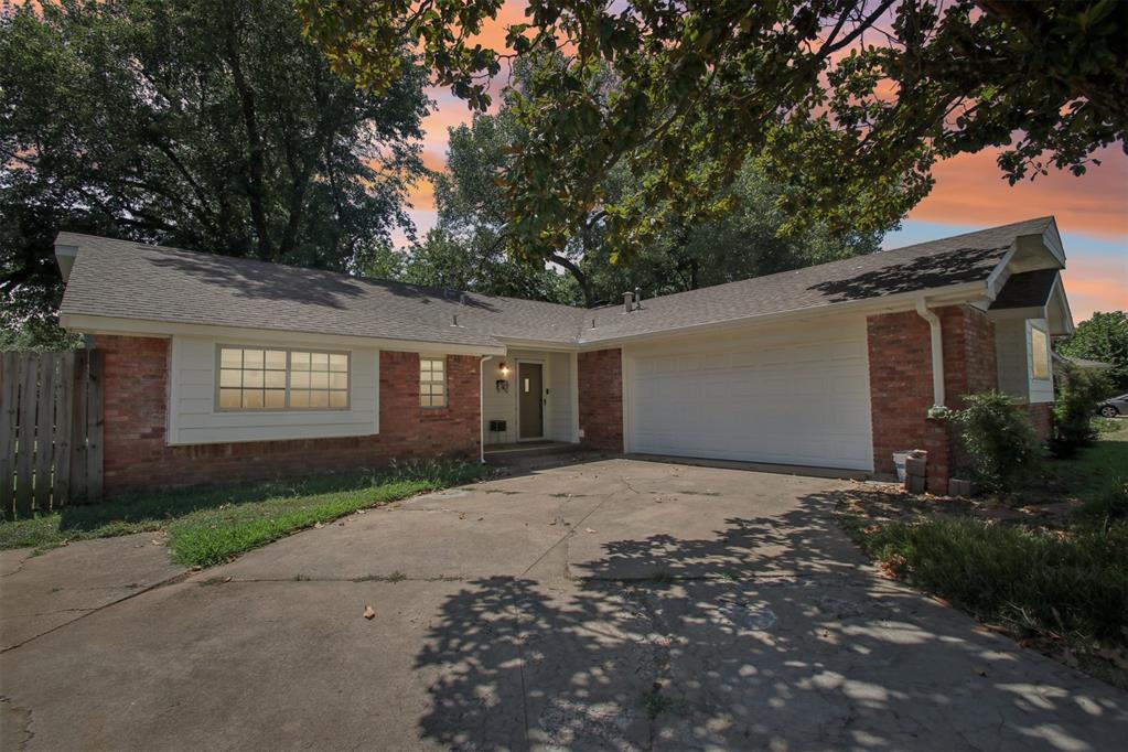 Located in one of Norman’s most well-established and desirable neighborhoods, this charming home offers timeless character, modern functionality, and a peaceful setting among mature trees. With a north-facing front, enjoy natural shade and a quiet, comfortable atmosphere year-round. Step inside to find a welcoming living area featuring a brick fireplace flanked by built-in bookshelves—the perfect focal point for relaxing or entertaining. The home is carpet-free, making it allergy- and pet-friendly with low-maintenance flooring throughout. The kitchen is well-equipped with a built-in gas cooktop, built-in oven range, and plenty of cabinet storage to keep everything organized. The 3 bedrooms and 2 full bathrooms offer comfortable living for families, guests, or work-from-home needs. Additional highlights include a side-entry garage, outdoor shed for extra storage, and easy access to schools. The University of Oklahoma is only 7 minutes away! Don’t miss your chance to live in one of Norman’s most beloved areas at such an affordable price—schedule your tour today!