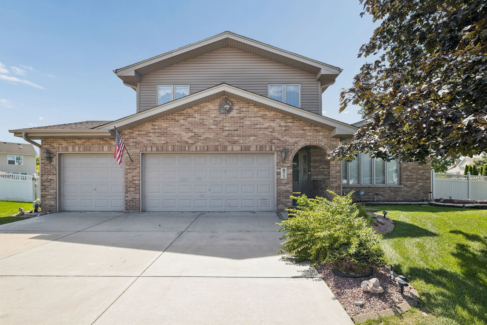 Custom built by its original owner and thoughtfully maintained over the years, this spacious split-level home showcases true pride of ownership and a large, open, functional floor plan with plenty of room to spread out. Ideally situated on a quiet and private cul-de-sac, this home offers a peaceful setting while still being close to everything. Step inside to an impressive foyer featuring soaring vaulted ceilings and an exposed beam that immediately gives the home character. The large eat-in kitchen features granite countertops, offers plenty of space for everyday dining and opens to the living room below, complete with a cozy gas fireplace. A separate formal dining room and an additional spacious front living room provide even more flexibility for entertaining and everyday living. Convenient main level laundry adds to the home's functionality. One of the highlights of the home is the huge bonus sunroom that leads to the private backyard! An ideal spot to relax, entertain, or enjoy the views throughout the seasons. Step outside to the covered brick paver patio, creating the perfect setup for outdoor dining and gatherings. Upstairs you'll find four spacious bedrooms, all offering ample closet space. The primary suite features a private full bathroom and walk-in closet. New carpet downstairs and new vinyl flooring upstairs give the space a fresh feel. The huge unfinished basement features tall ceilings and offers loads of potential for additional living space, a home gym, recreation area, storage, or whatever fits your needs. Large 3-car attached garage is perfect for handymen/car enthusiast and provides abundant storage opportunities. Brand new A/C adds another great update. Fantastic location within Minooka School District and conveniently close to shopping, restaurants, schools, parks, and bike paths. This well loved, custom built home with generous living space is truly a blank canvas and holds so much potential, don't miss the opportunity to make it yours!